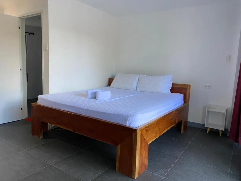 Bed in Malipaj Apartments