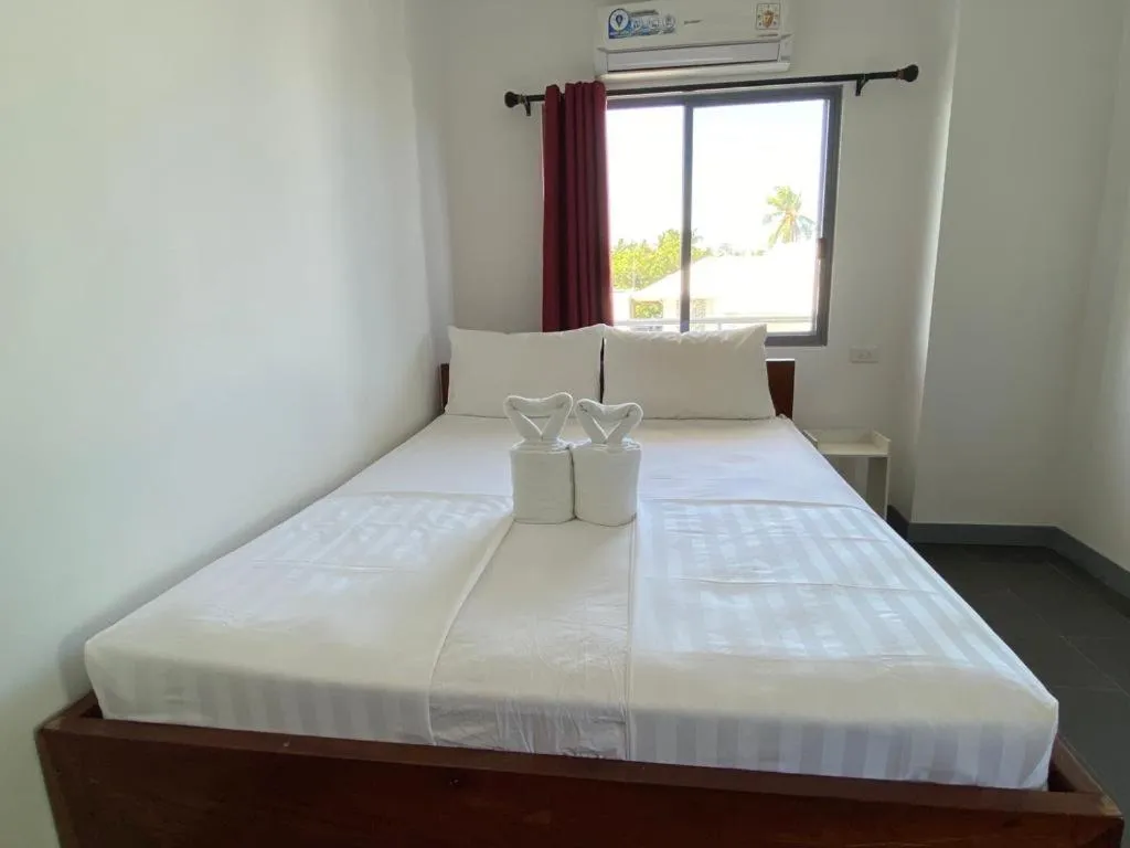 Bed in Malipaj Apartments