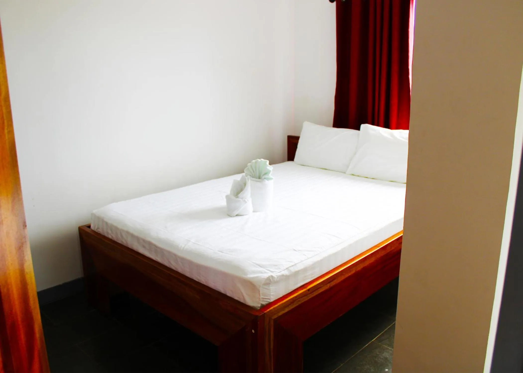 Bed in Malipaj Apartments