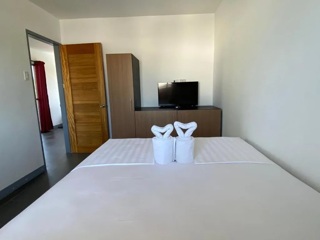 Bed in Malipaj Apartments