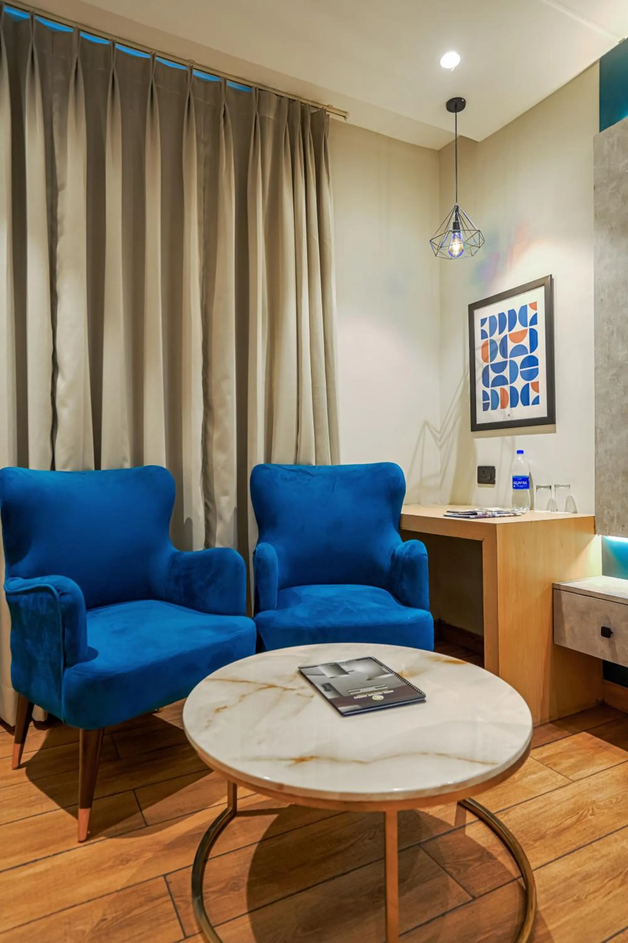 Seating area in Hotel Highway Greens Near VR Punjab Mall Airport Road Mohali Chandigarh