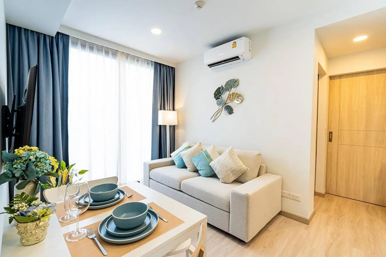Living room in Laguna Skypark by My Home Phuket