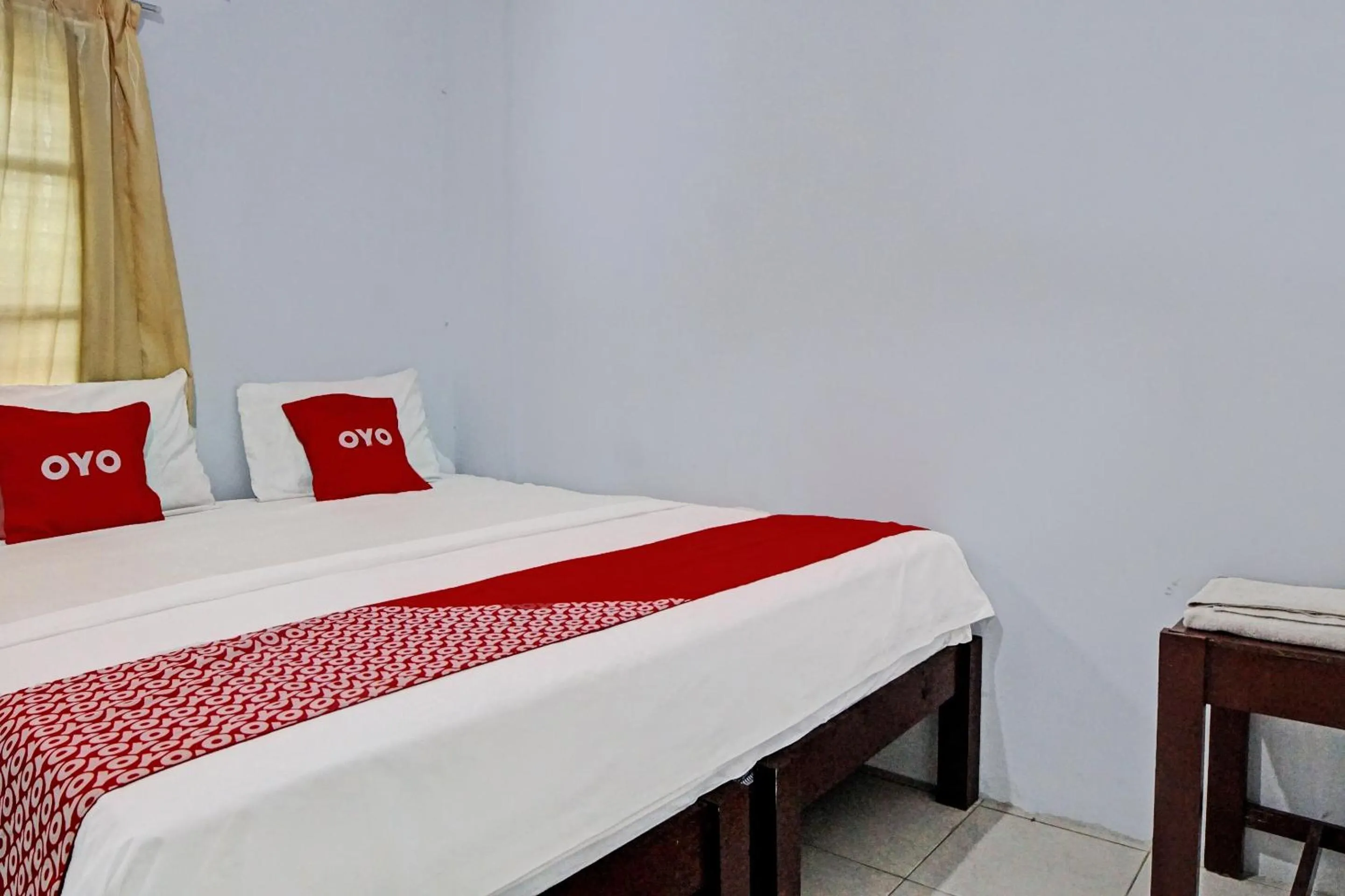 Bedroom in Hotel O Vania Guest HouseNearRSUP H Adam Malik