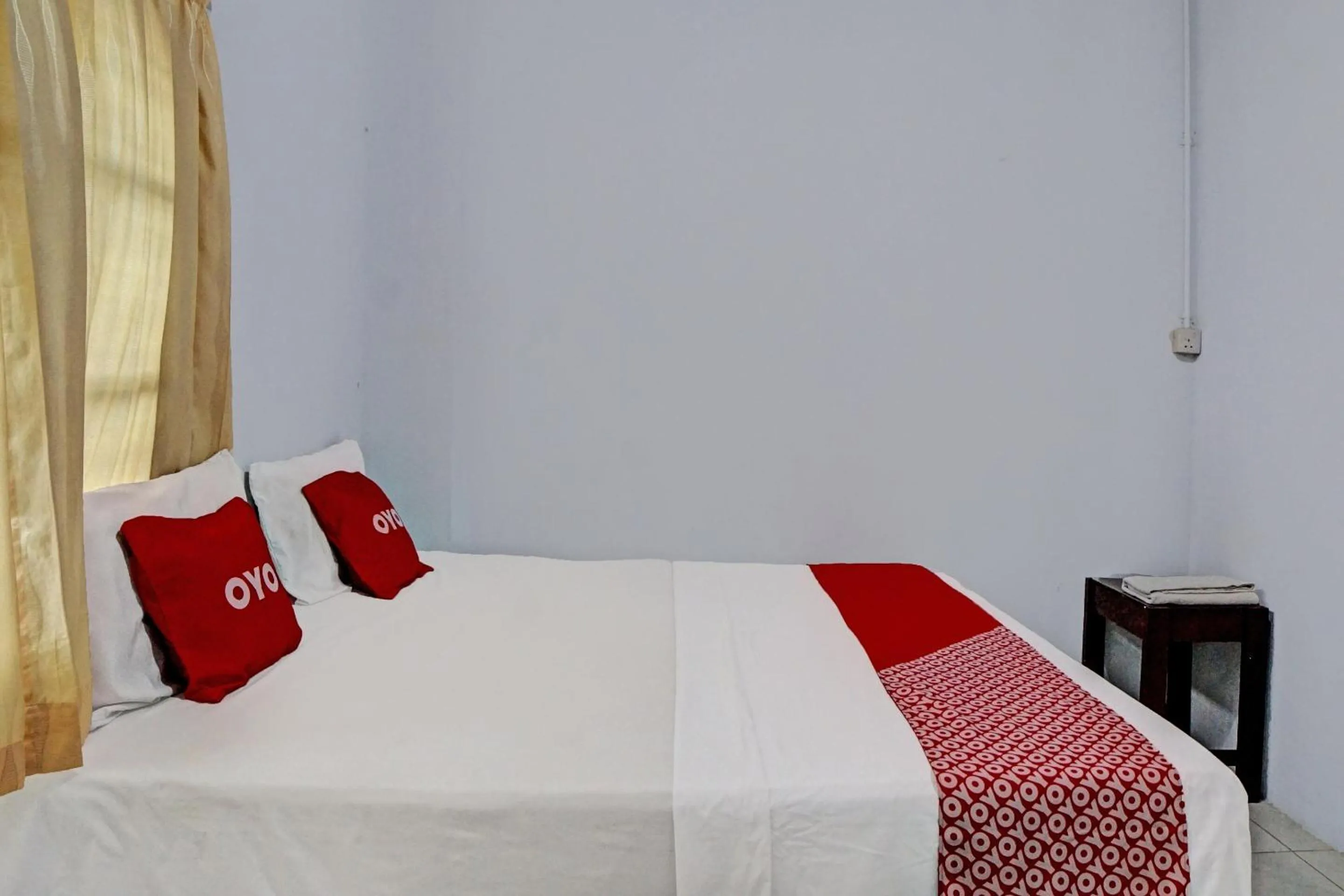 Bedroom in Hotel O Vania Guest HouseNearRSUP H Adam Malik