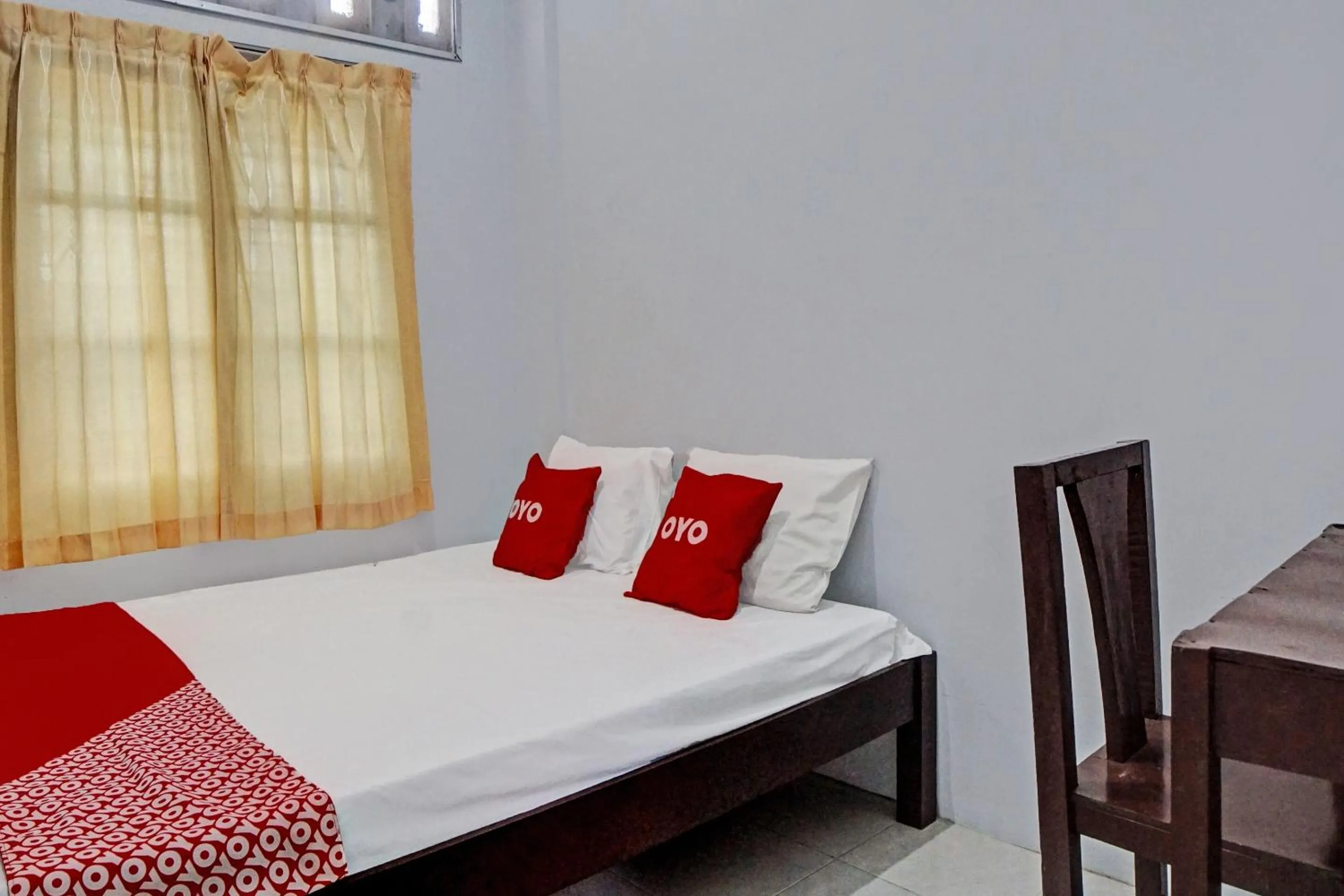 Bedroom in Hotel O Vania Guest HouseNearRSUP H Adam Malik