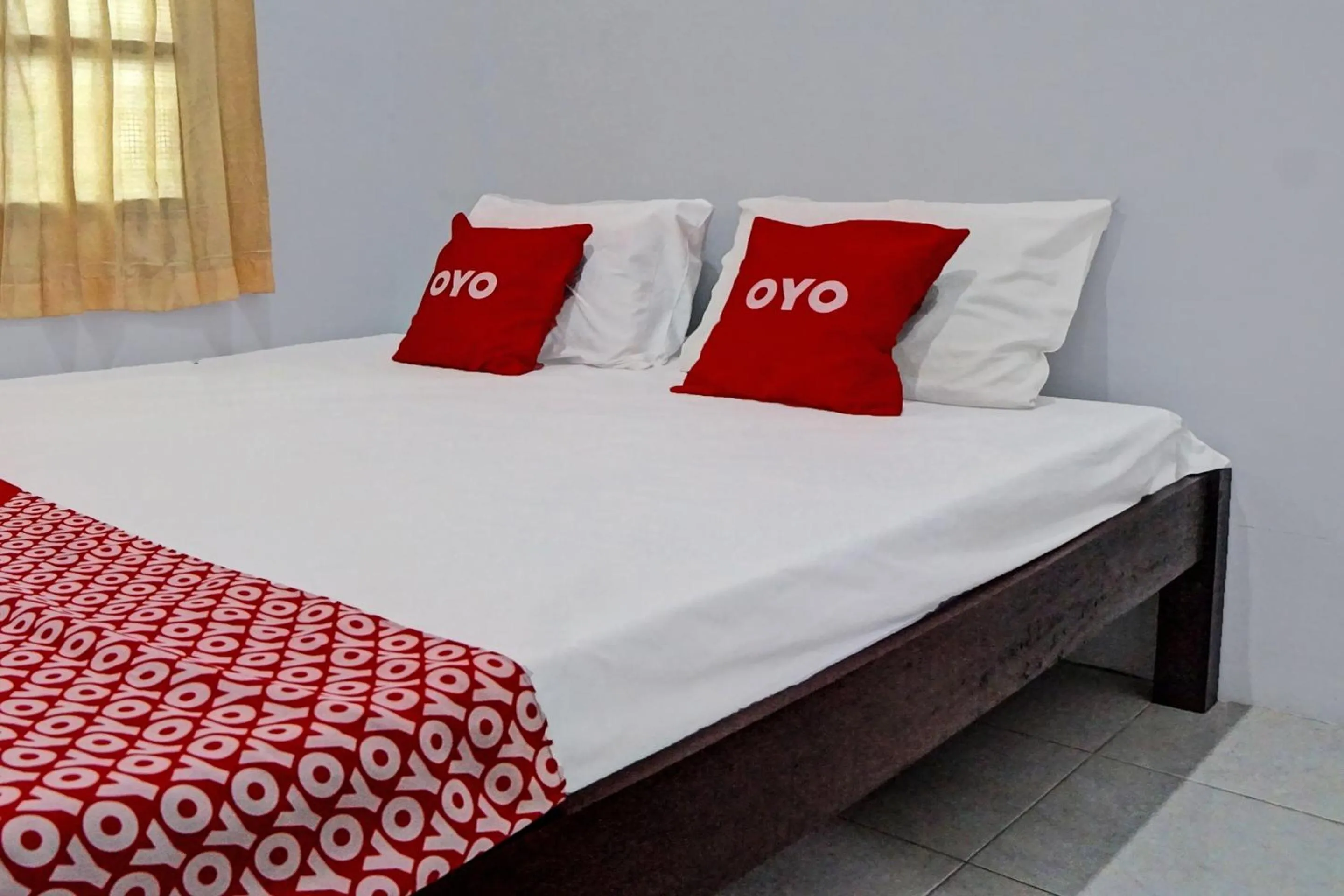 Bedroom in Hotel O Vania Guest HouseNearRSUP H Adam Malik
