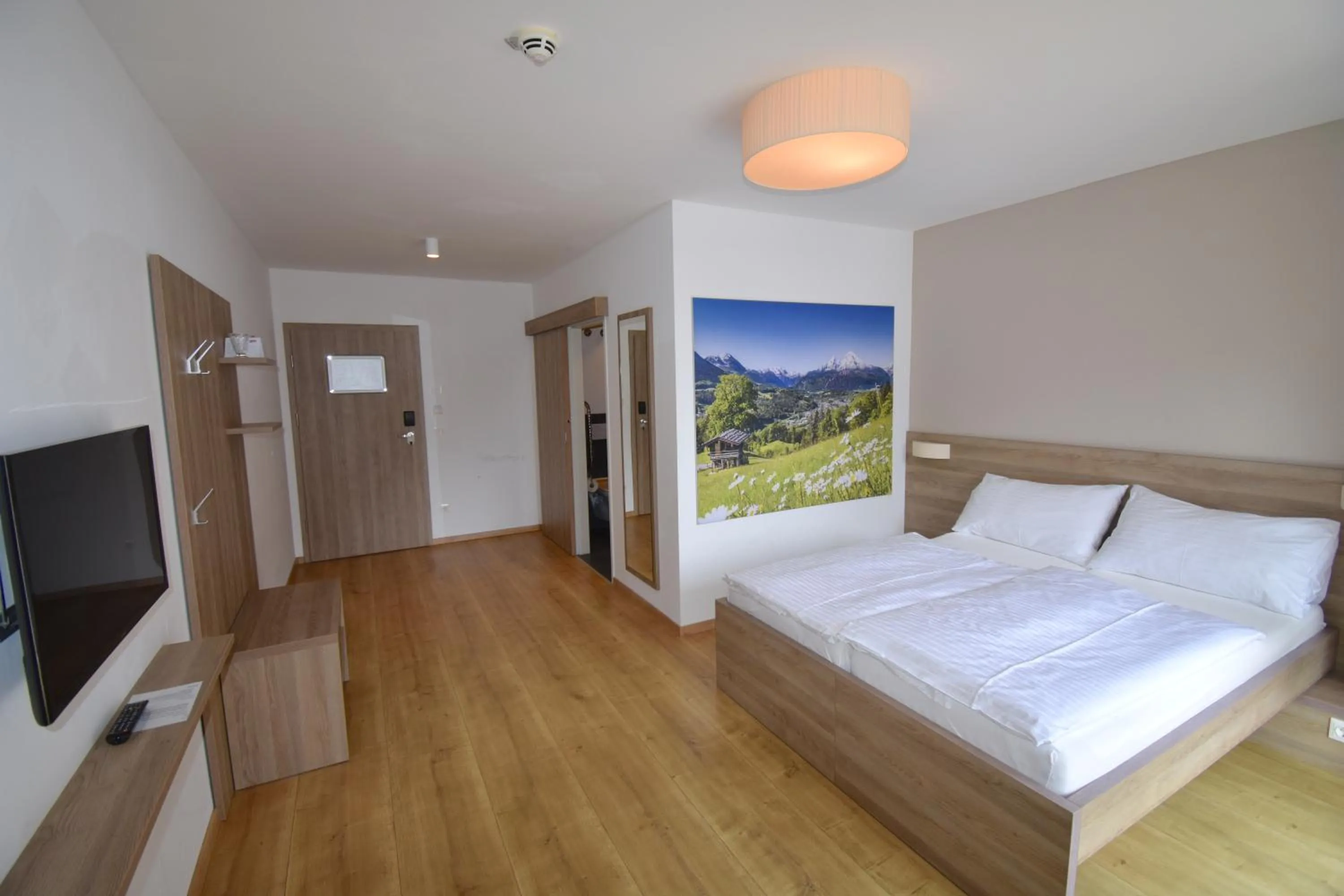 Photo of the whole room, Bed in Sporthotel Zederhaus im Lungau