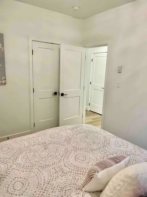 Bed in Adorable 1 Bedroom Suite- a skip to Galloping Goose
