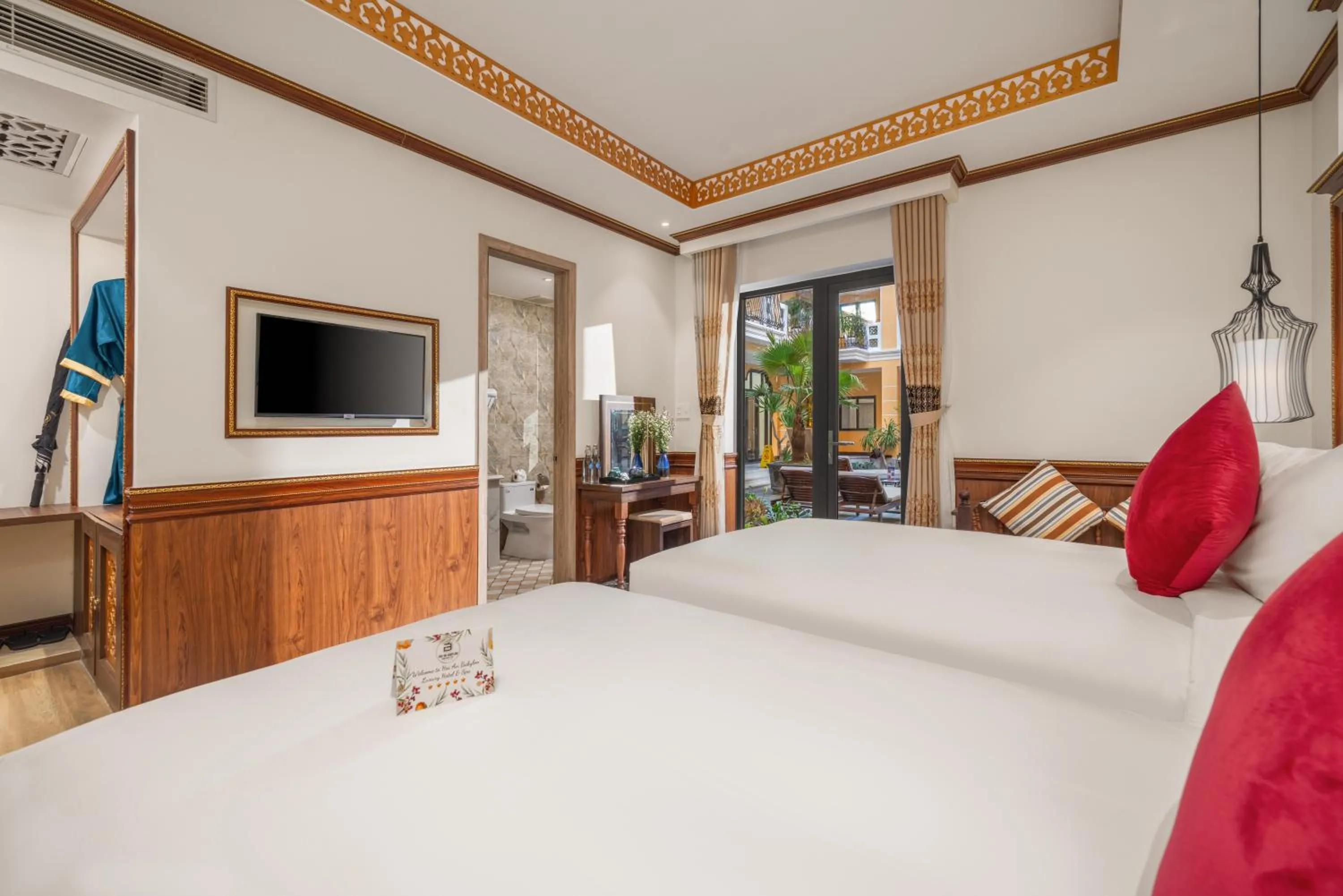 Bed in Soluna D'Annam - The Art of Hoi An Relaxation - formerly Hoi An Babylon Riverside Hotel