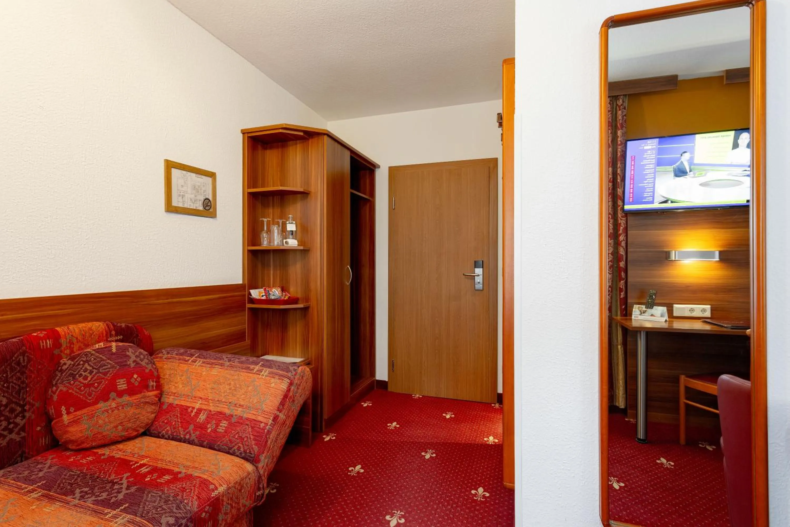 Bathroom in TIPTOP Hotel Burgschmiet Garni