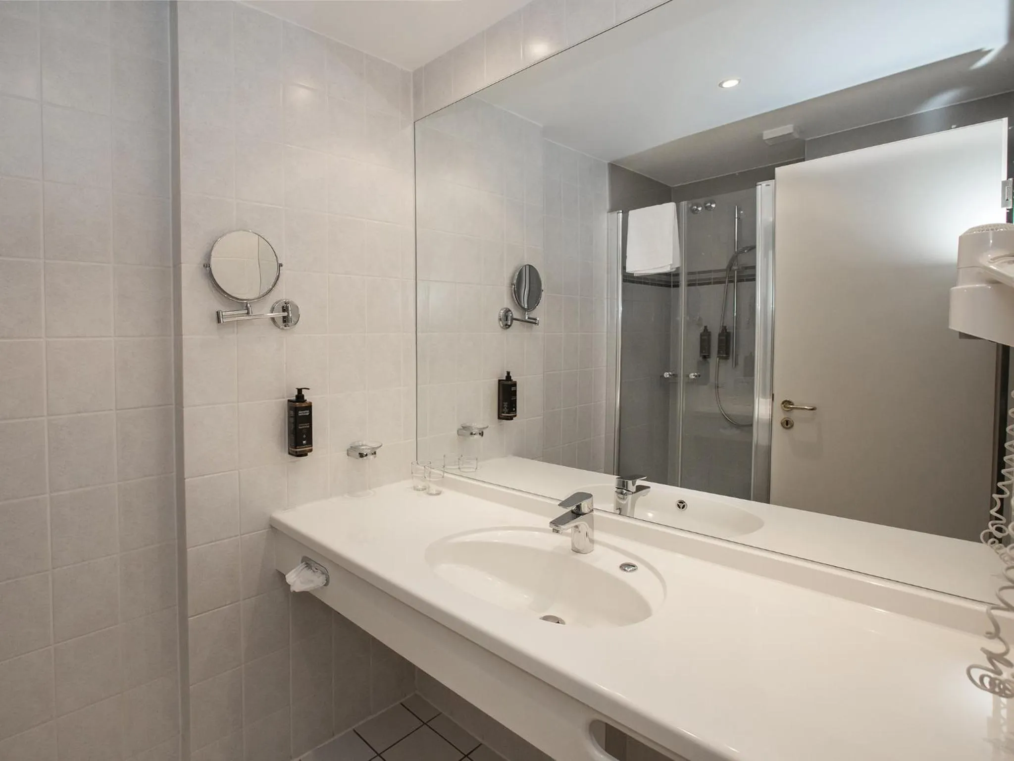 Bathroom in DORMERO Hotel Greifswald