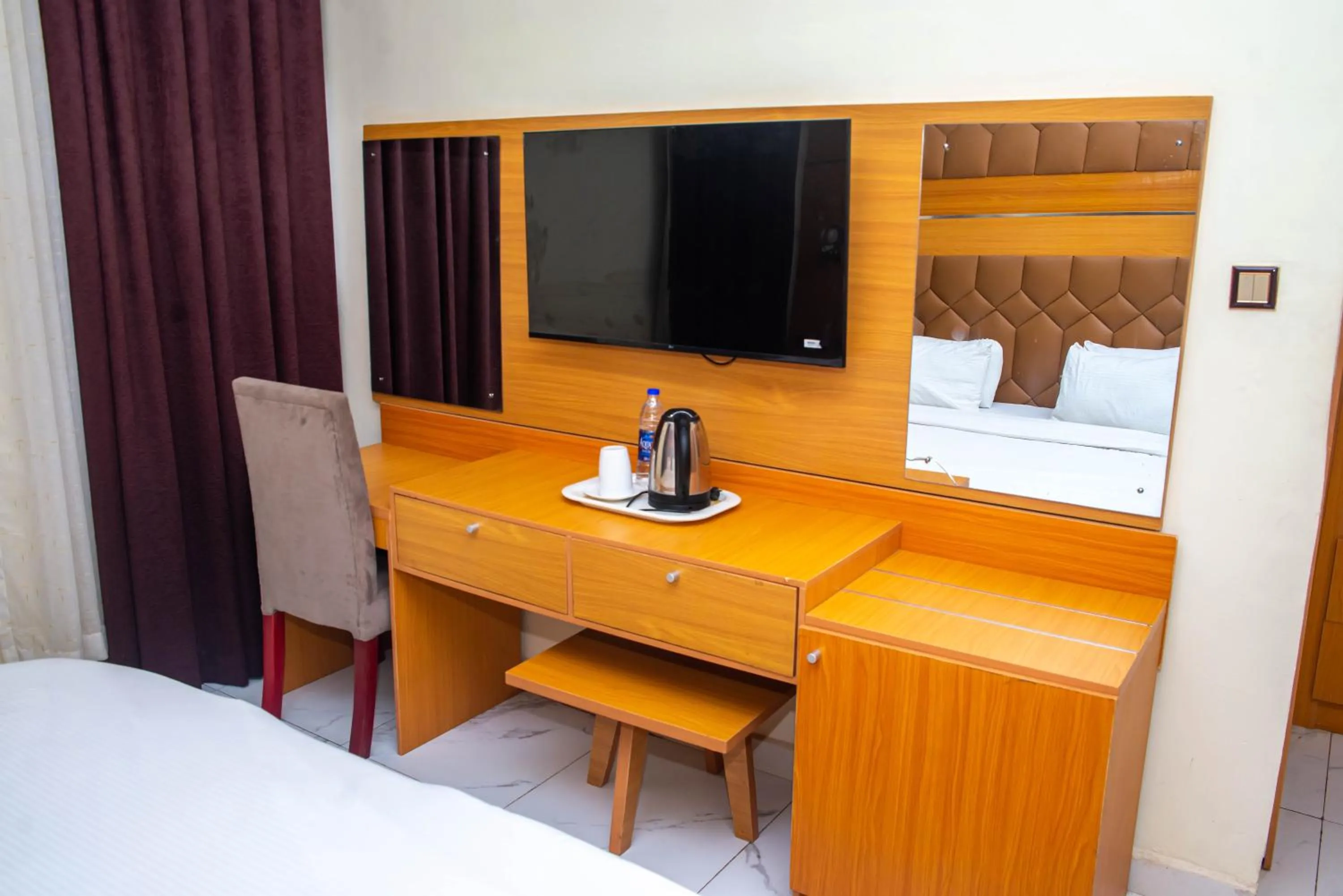 Bed in Buddiez Hotel & Resort