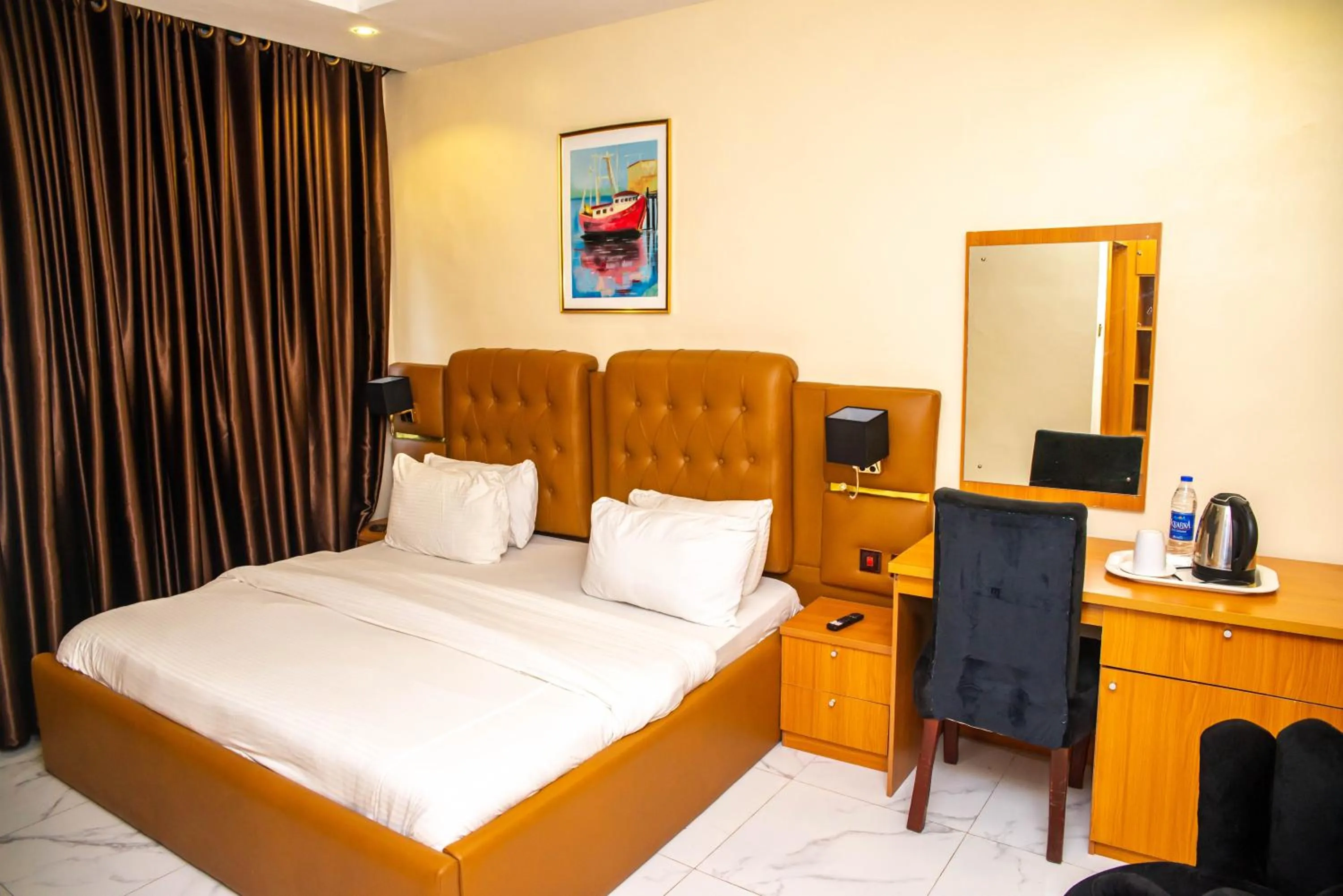 Bed in Buddiez Hotel & Resort