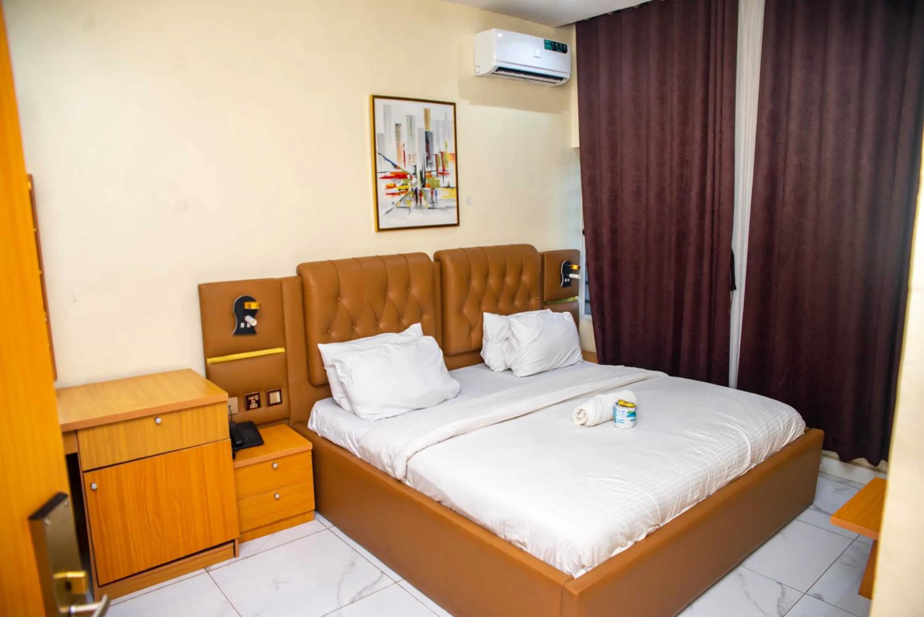 Bed in Buddiez Hotel & Resort