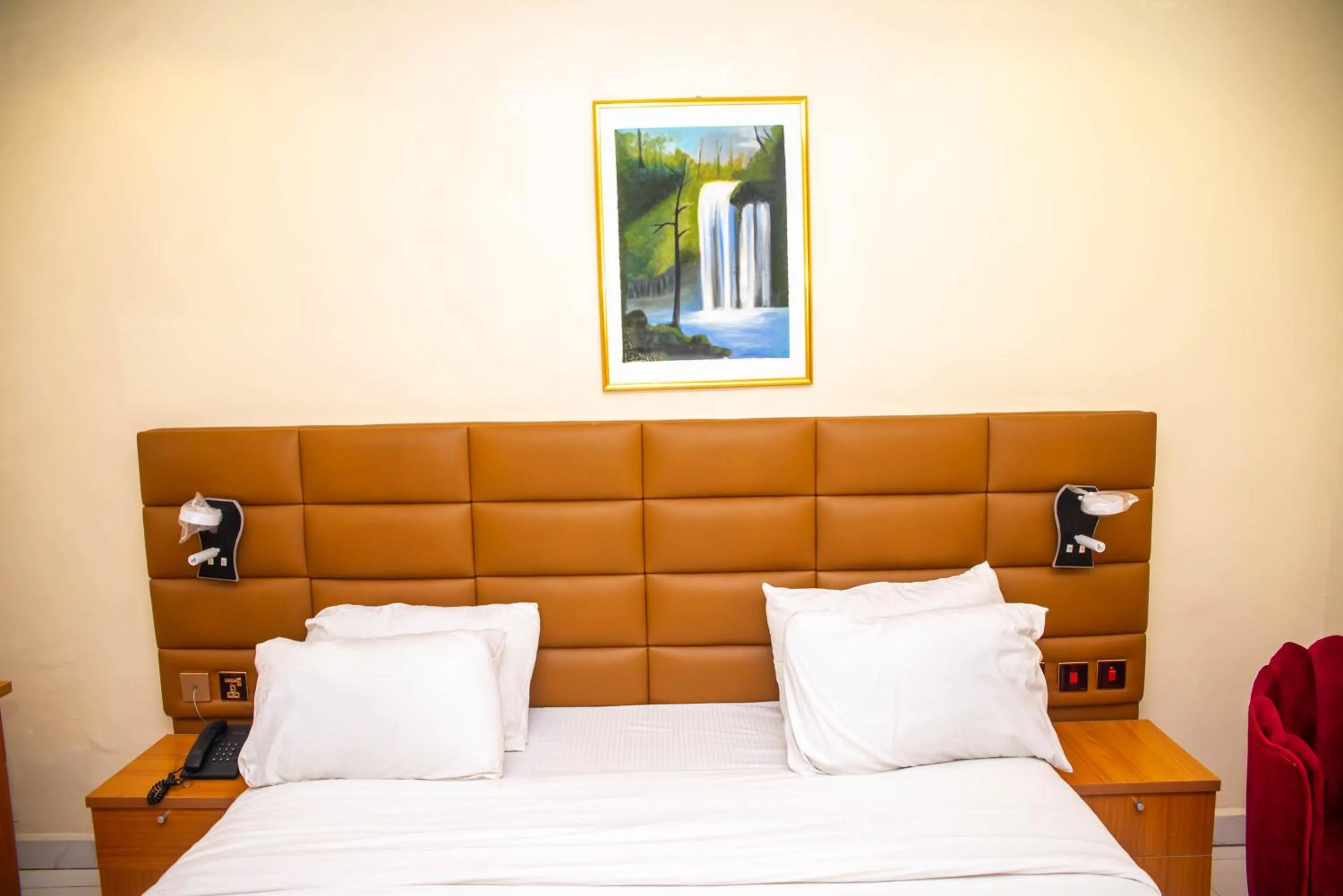 Bed in Buddiez Hotel & Resort