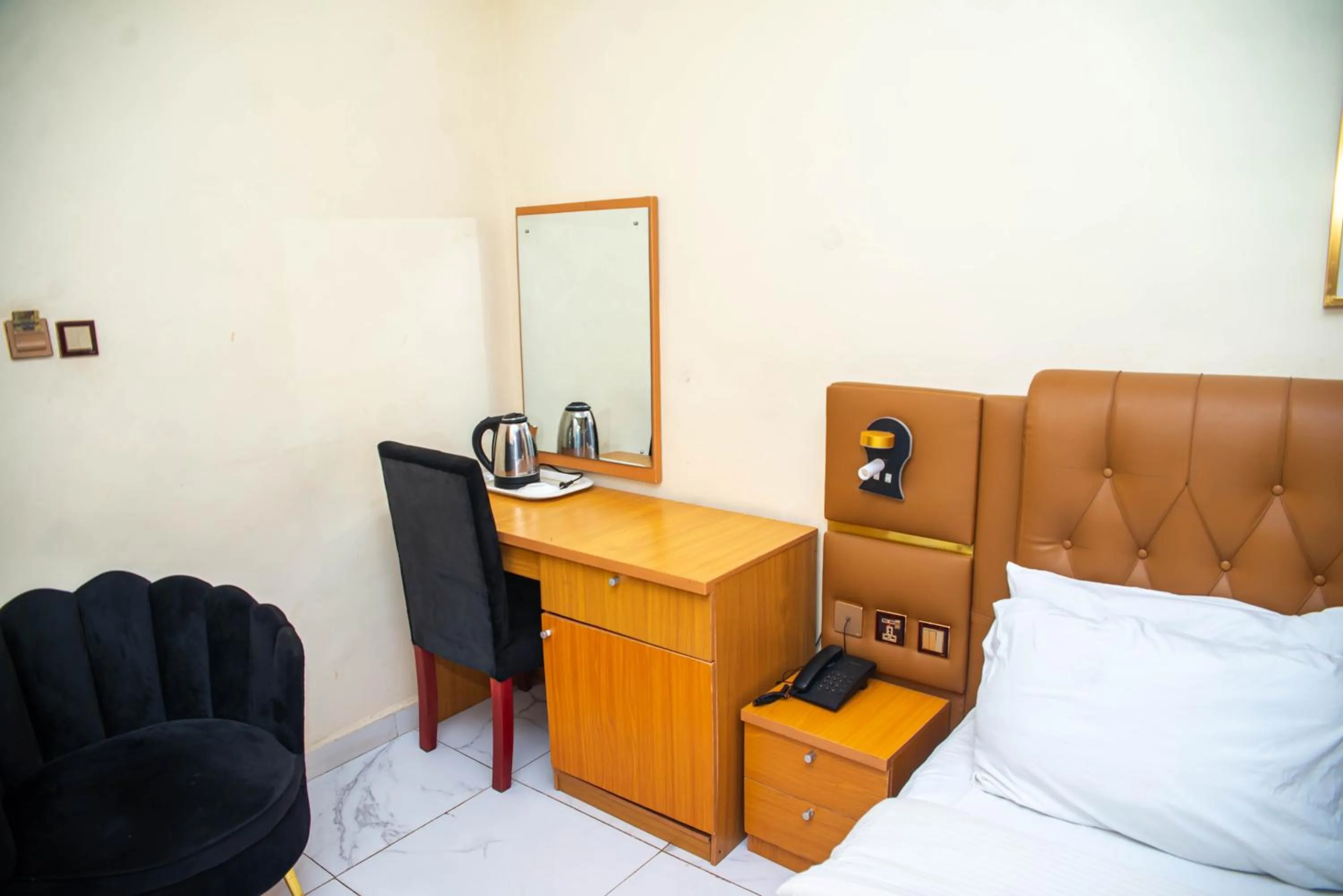 Bed in Buddiez Hotel & Resort