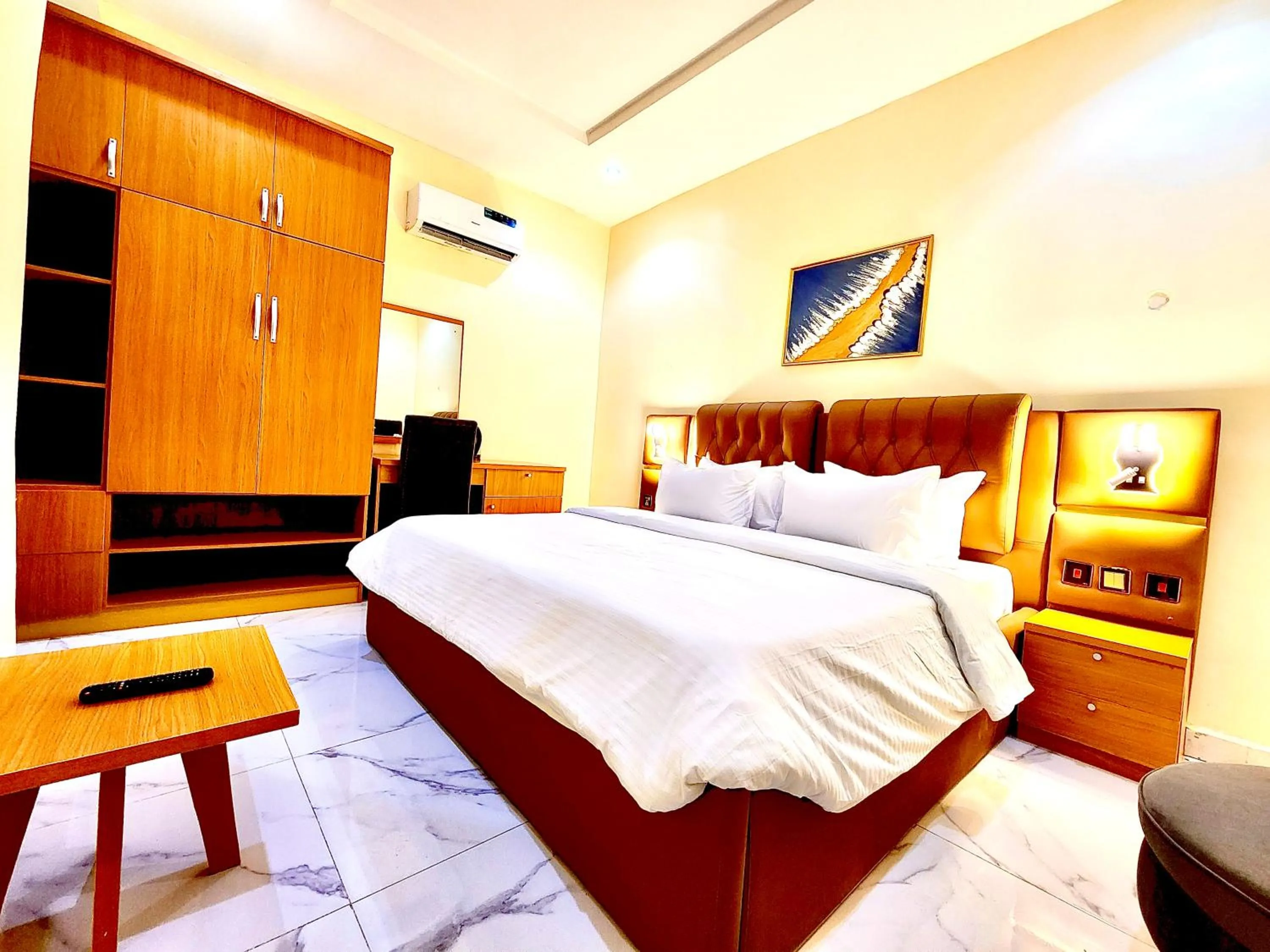 Bed in Buddiez Hotel & Resort