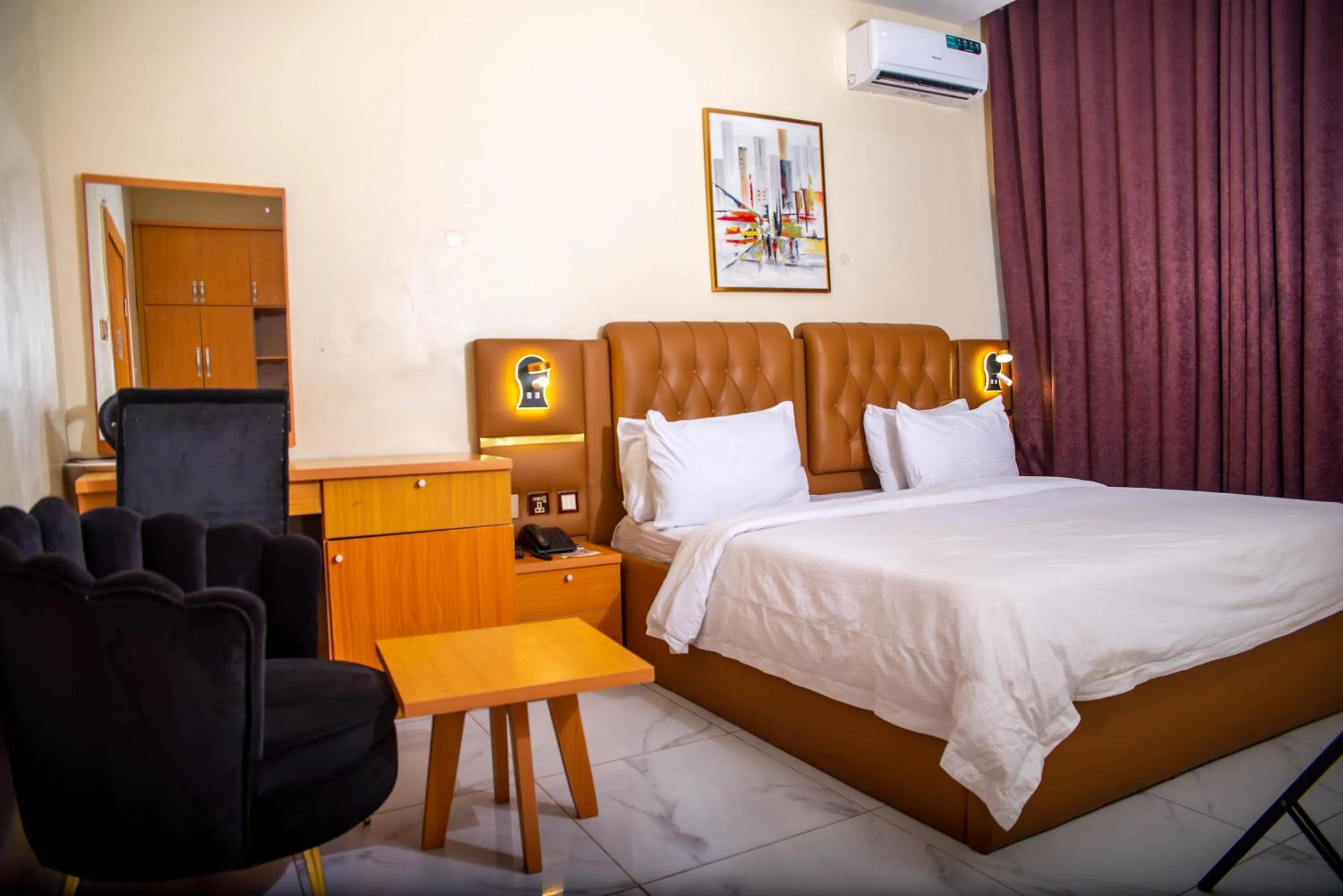 Bed in Buddiez Hotel & Resort