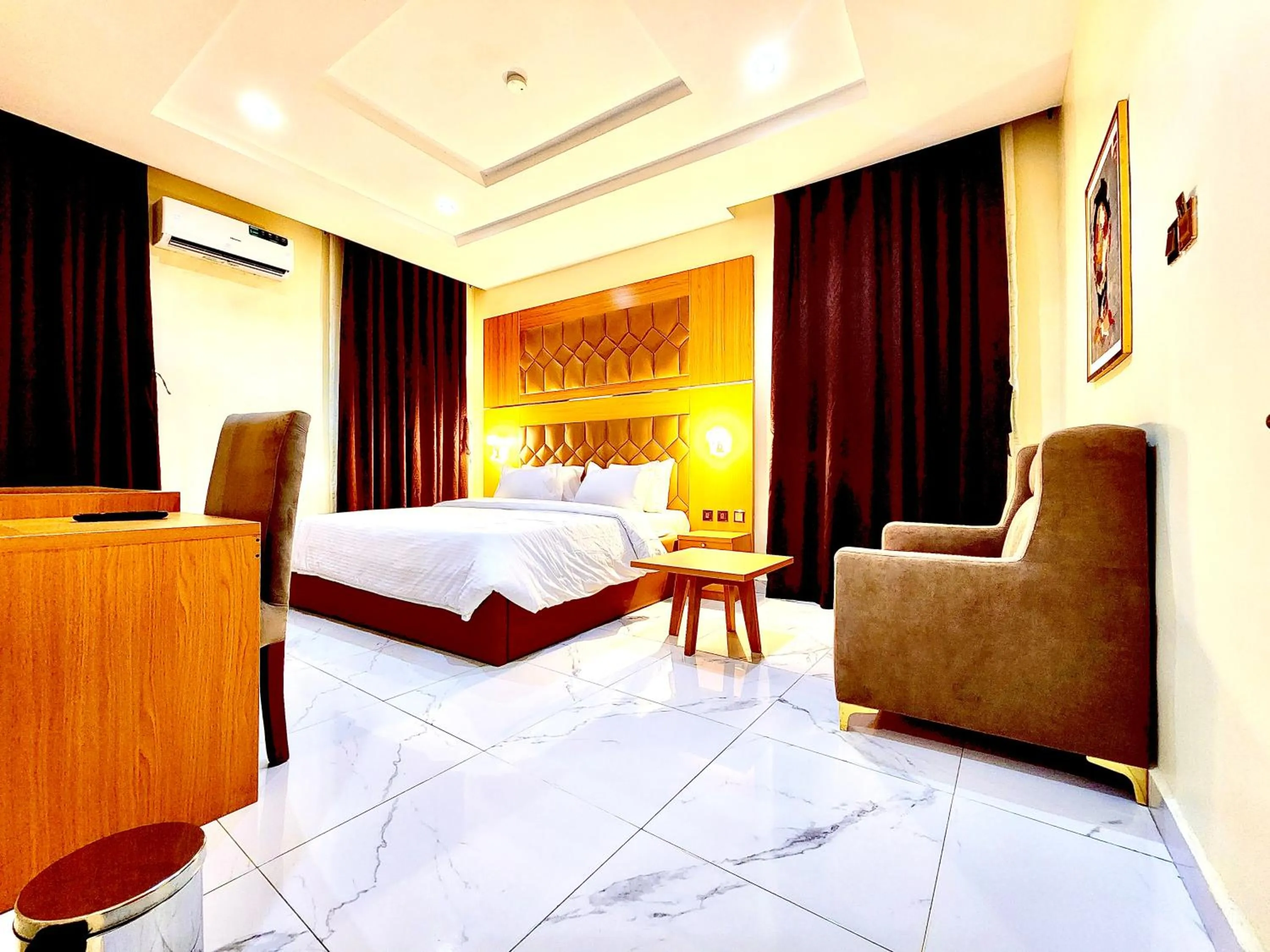 Bed in Buddiez Hotel & Resort