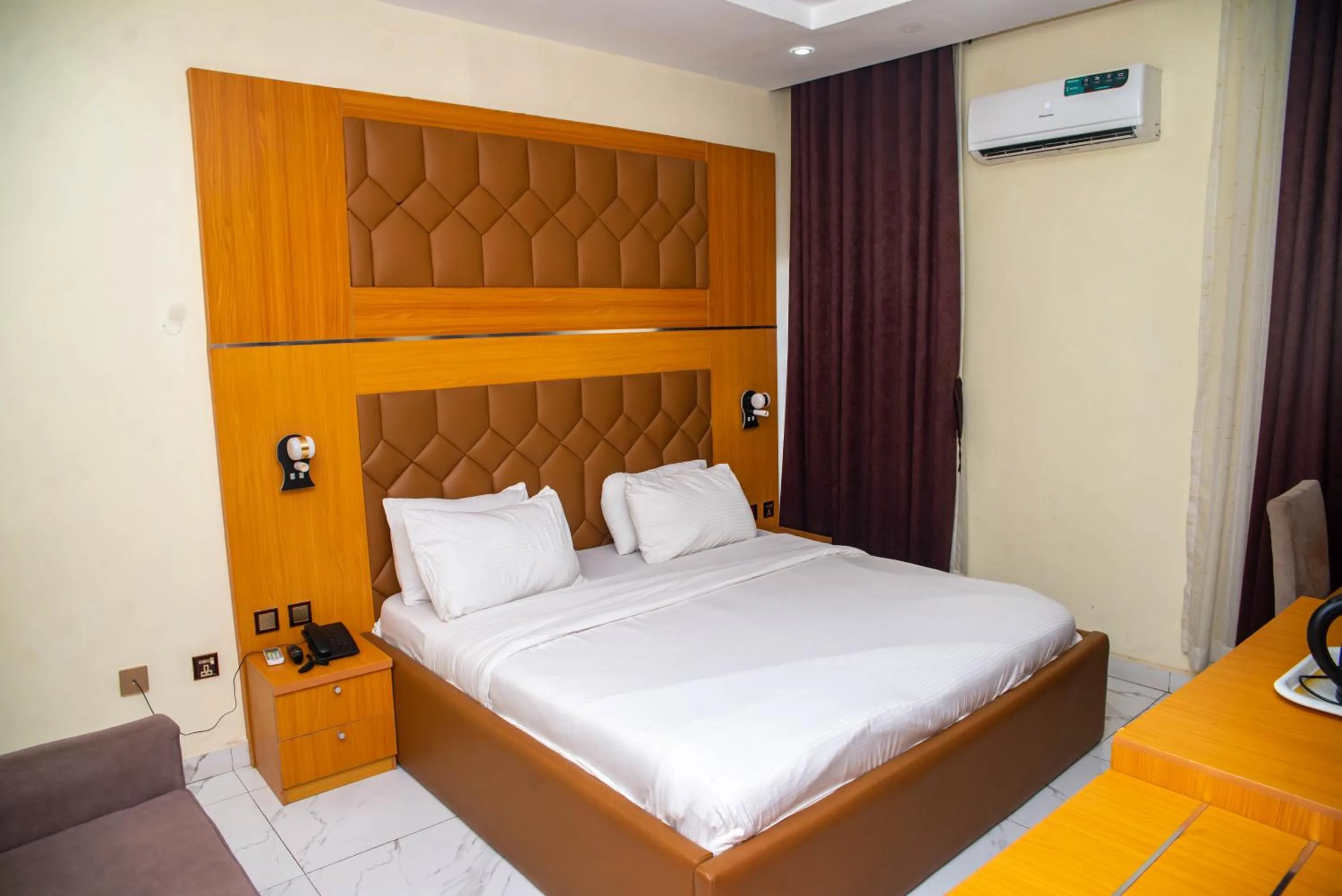 Bed in Buddiez Hotel & Resort