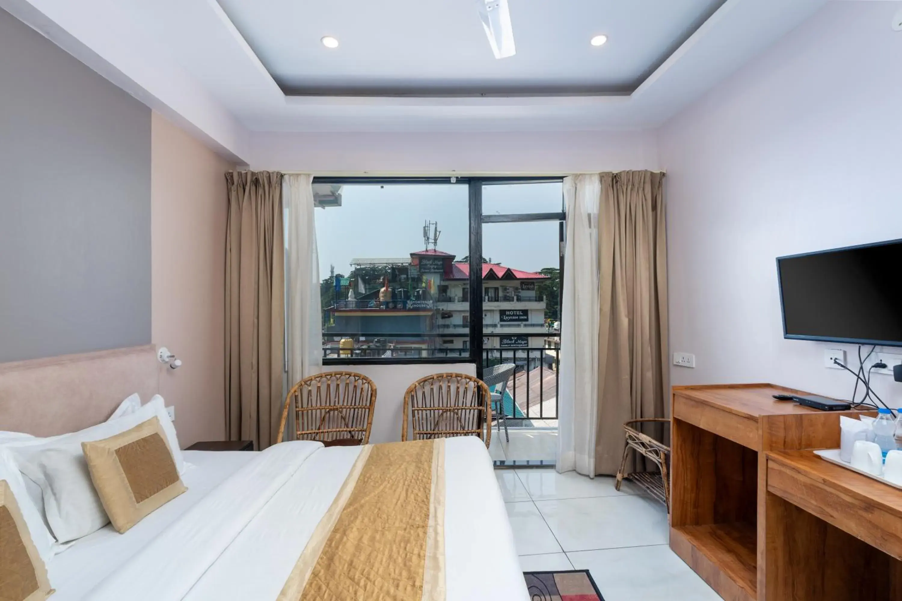 Deluxe Double Room with Balcony in Hotel Buddha's Abode- Best Hotel in McleodGanj Main Market Deluxe Double Room with Balcony in Hotel Buddha's Abode- Best Hotel in McleodGanj Main Market