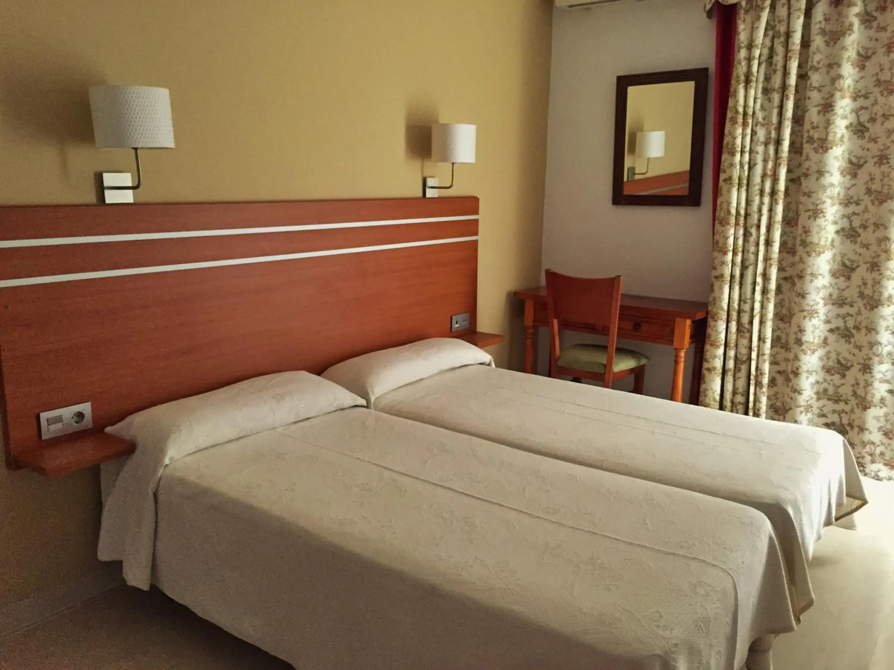 Bed in Hotel Carmen Teresa Bed in Hotel Carmen Teresa