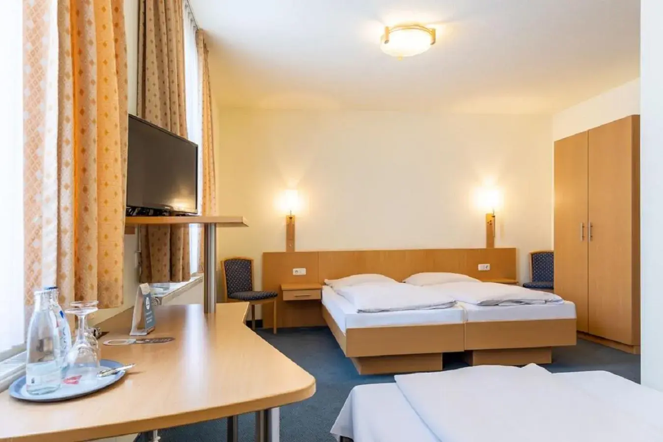 Bed in Trip Inn Hotel Conti Bed in Trip Inn Hotel Conti