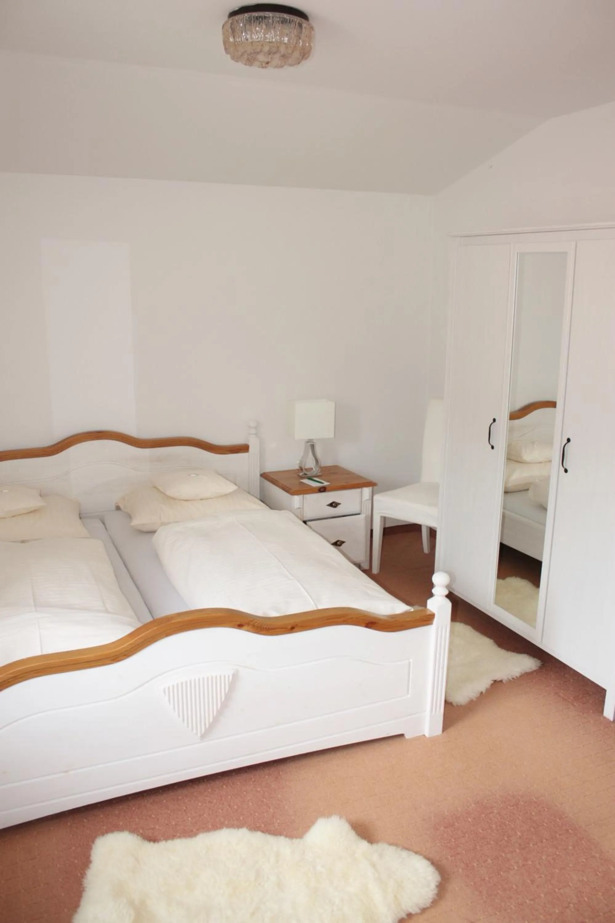 Photo of the whole room, Bed in Landhotel Maiergschwendt inkl Chiemgaukarte