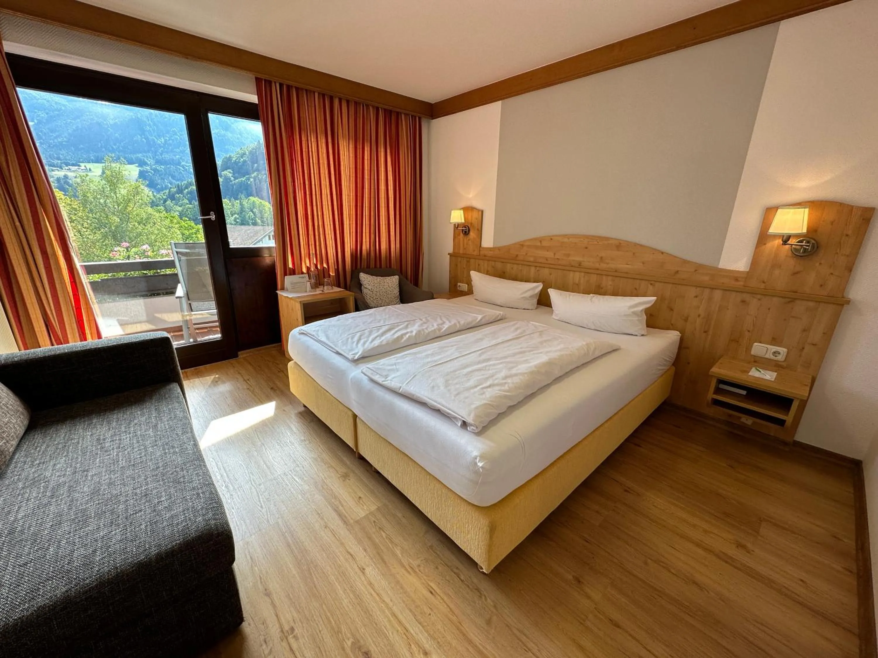 Photo of the whole room, Bed in Landhotel Maiergschwendt inkl Chiemgaukarte