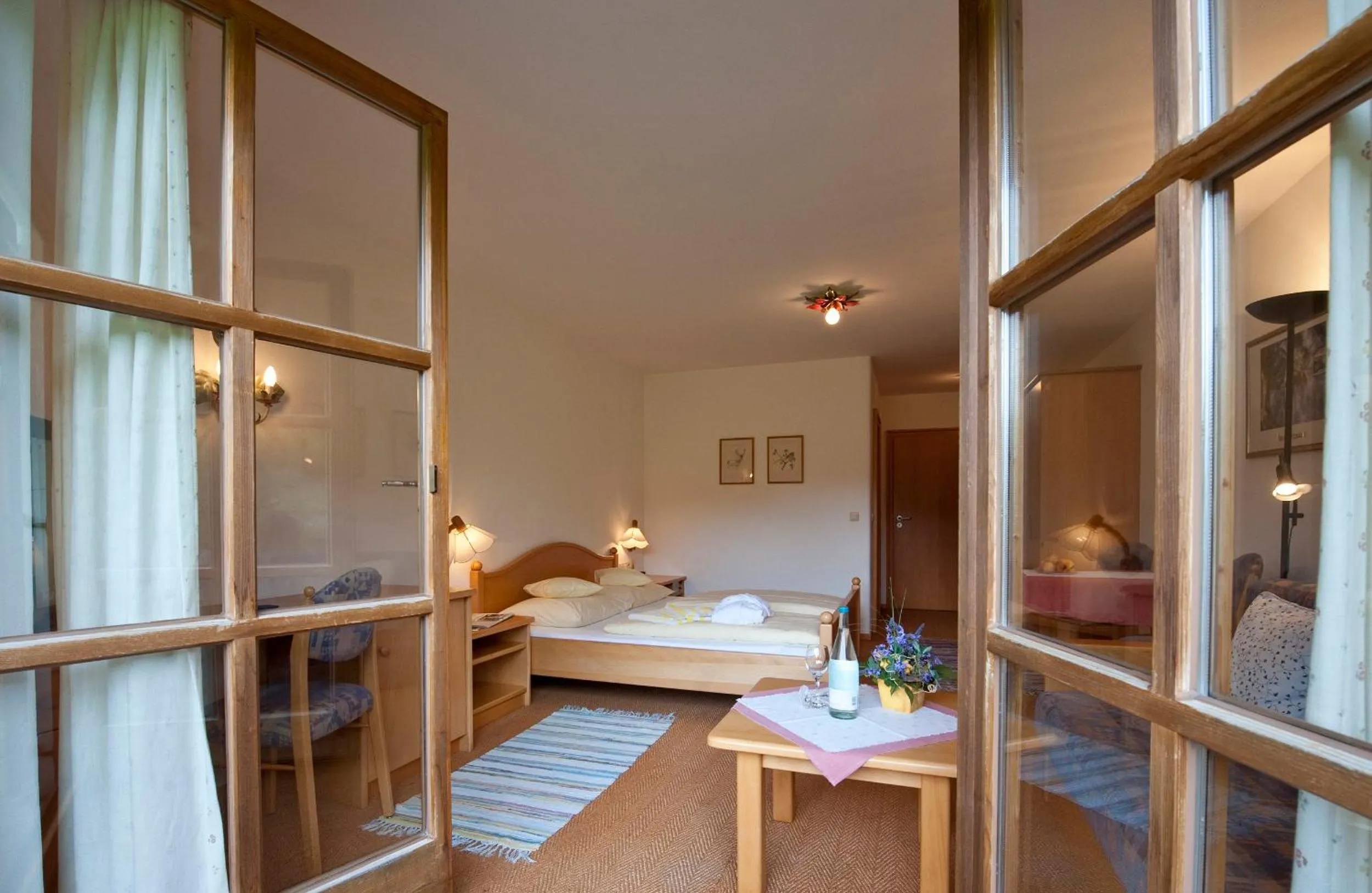 Photo of the whole room, Bed in Landhotel Maiergschwendt inkl Chiemgaukarte