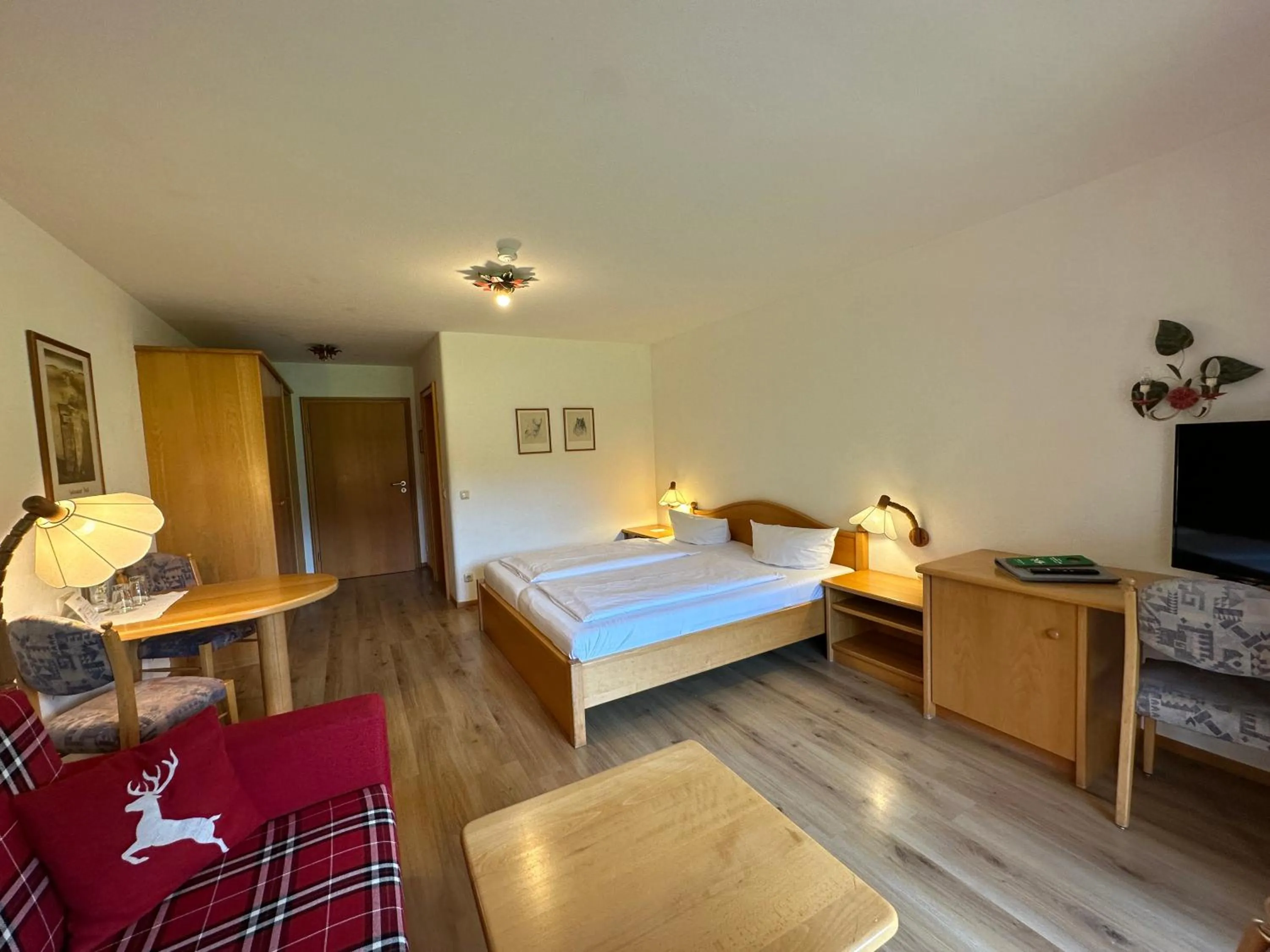 Photo of the whole room, Bed in Landhotel Maiergschwendt inkl Chiemgaukarte