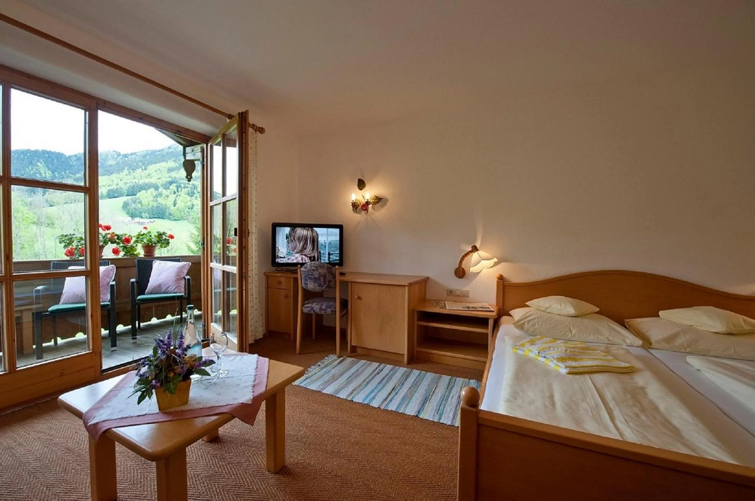 Photo of the whole room, Bed in Landhotel Maiergschwendt inkl Chiemgaukarte
