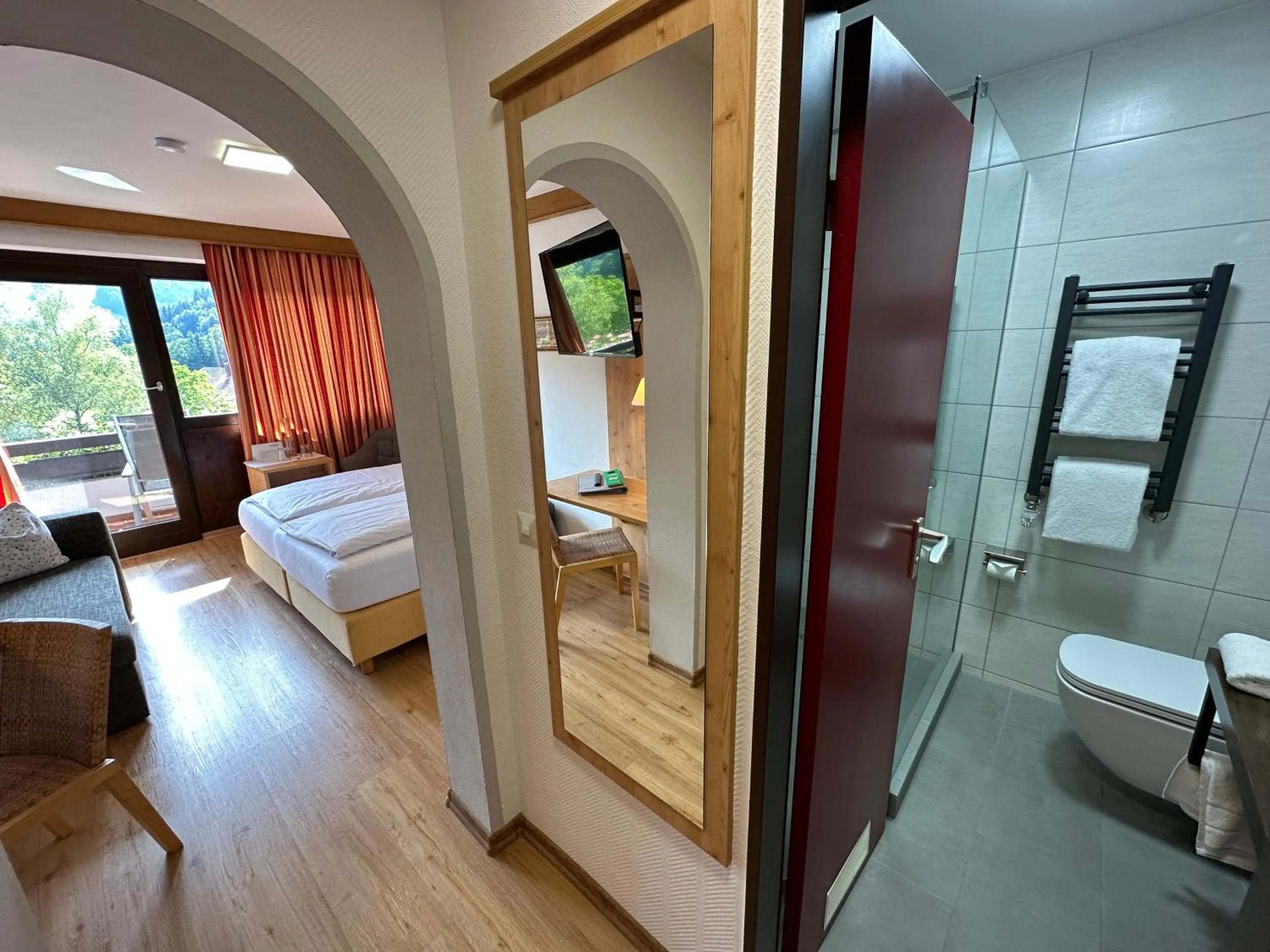 Bathroom, Bed in Landhotel Maiergschwendt inkl Chiemgaukarte