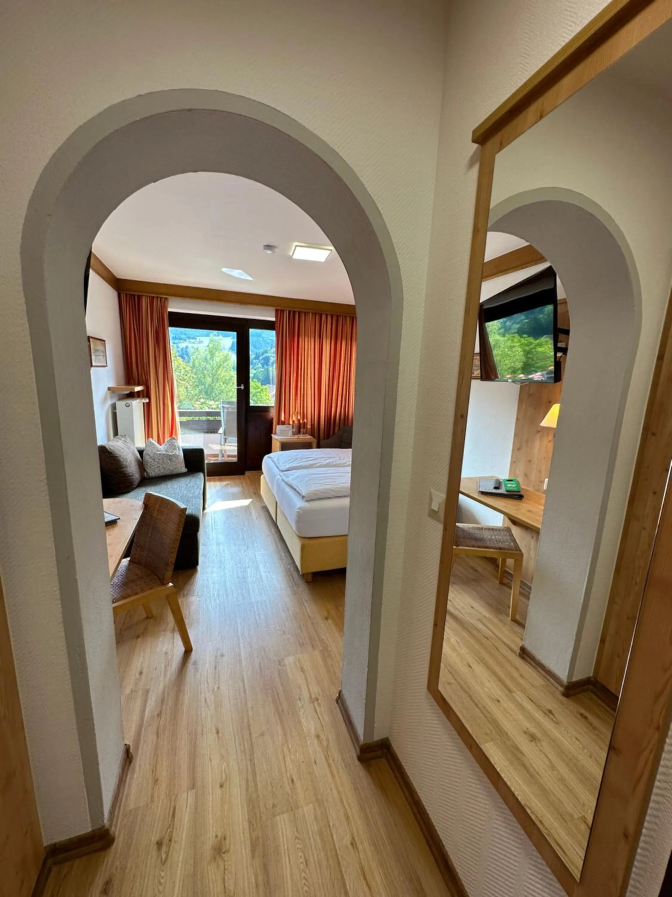 Photo of the whole room, Bed in Landhotel Maiergschwendt inkl Chiemgaukarte