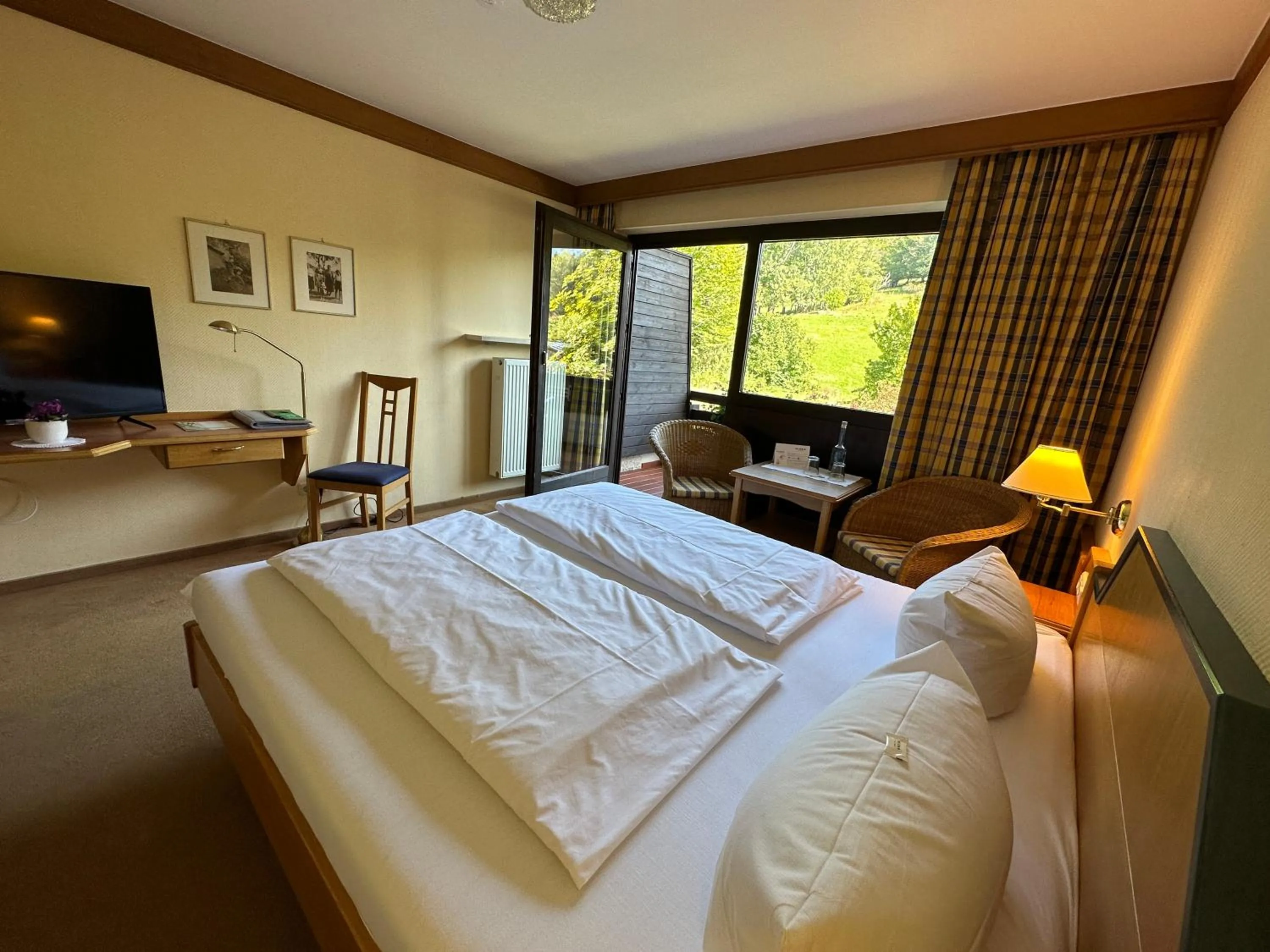 Photo of the whole room, Bed in Landhotel Maiergschwendt inkl Chiemgaukarte