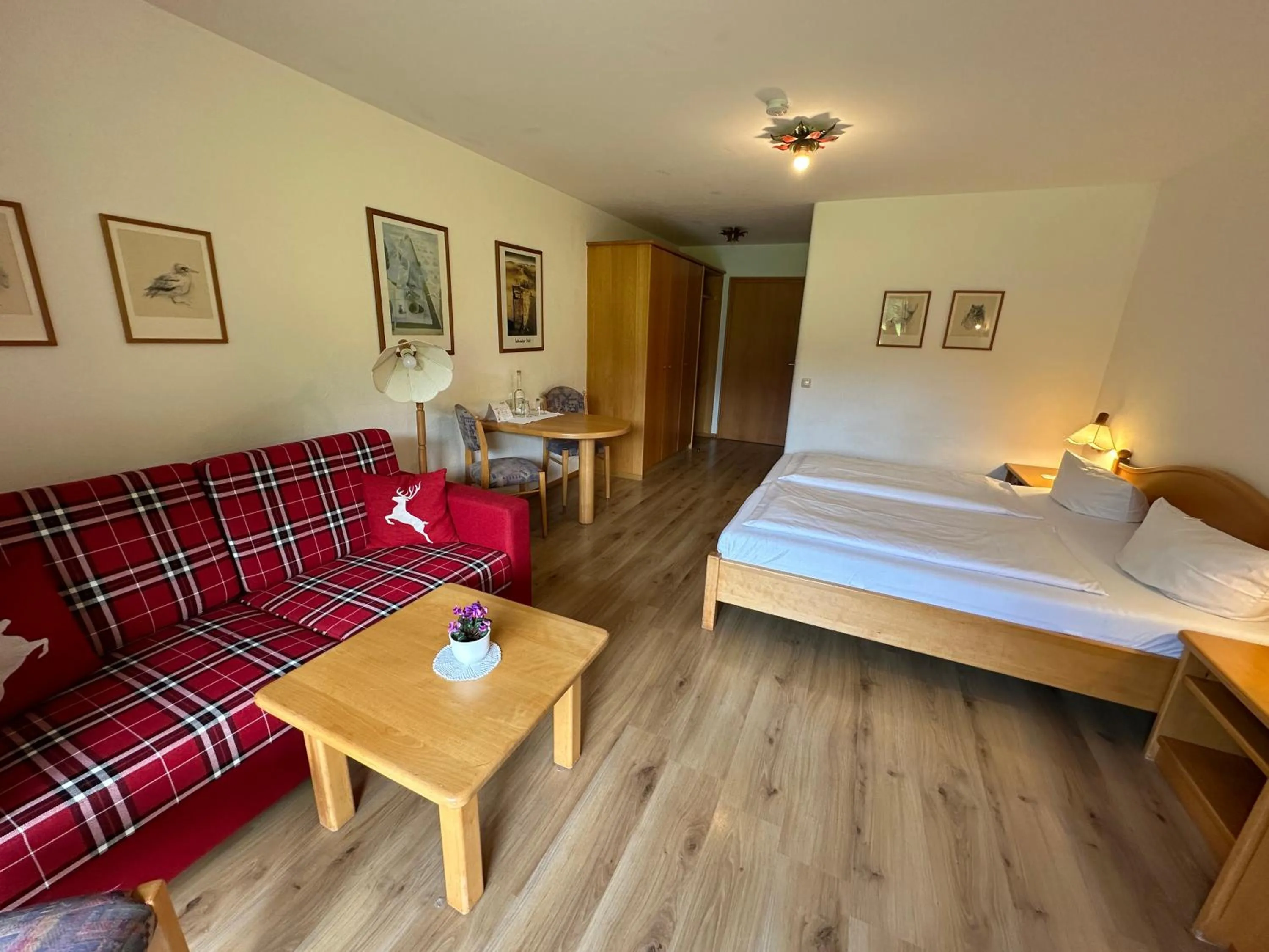 Photo of the whole room, Bed in Landhotel Maiergschwendt inkl Chiemgaukarte