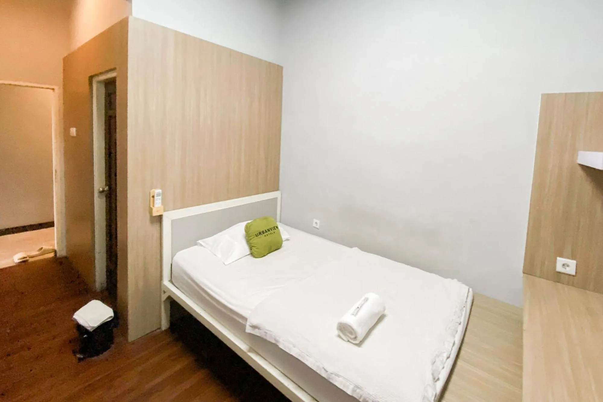Bedroom, Bed in Urbanview Hotel The Tang Balikpapan by RedDoorz