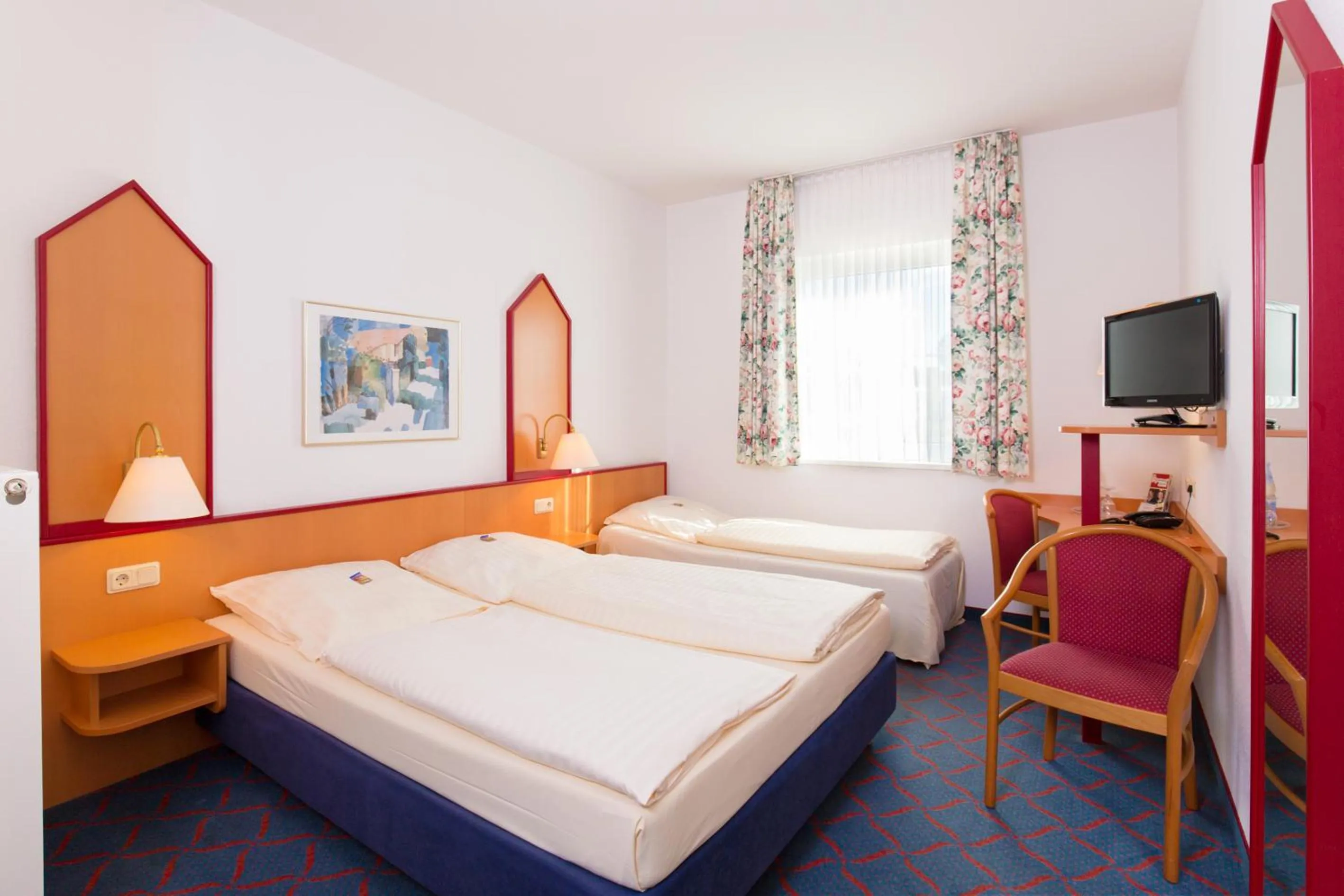 Photo of the whole room, Bed in Hotel Montana Lauenau