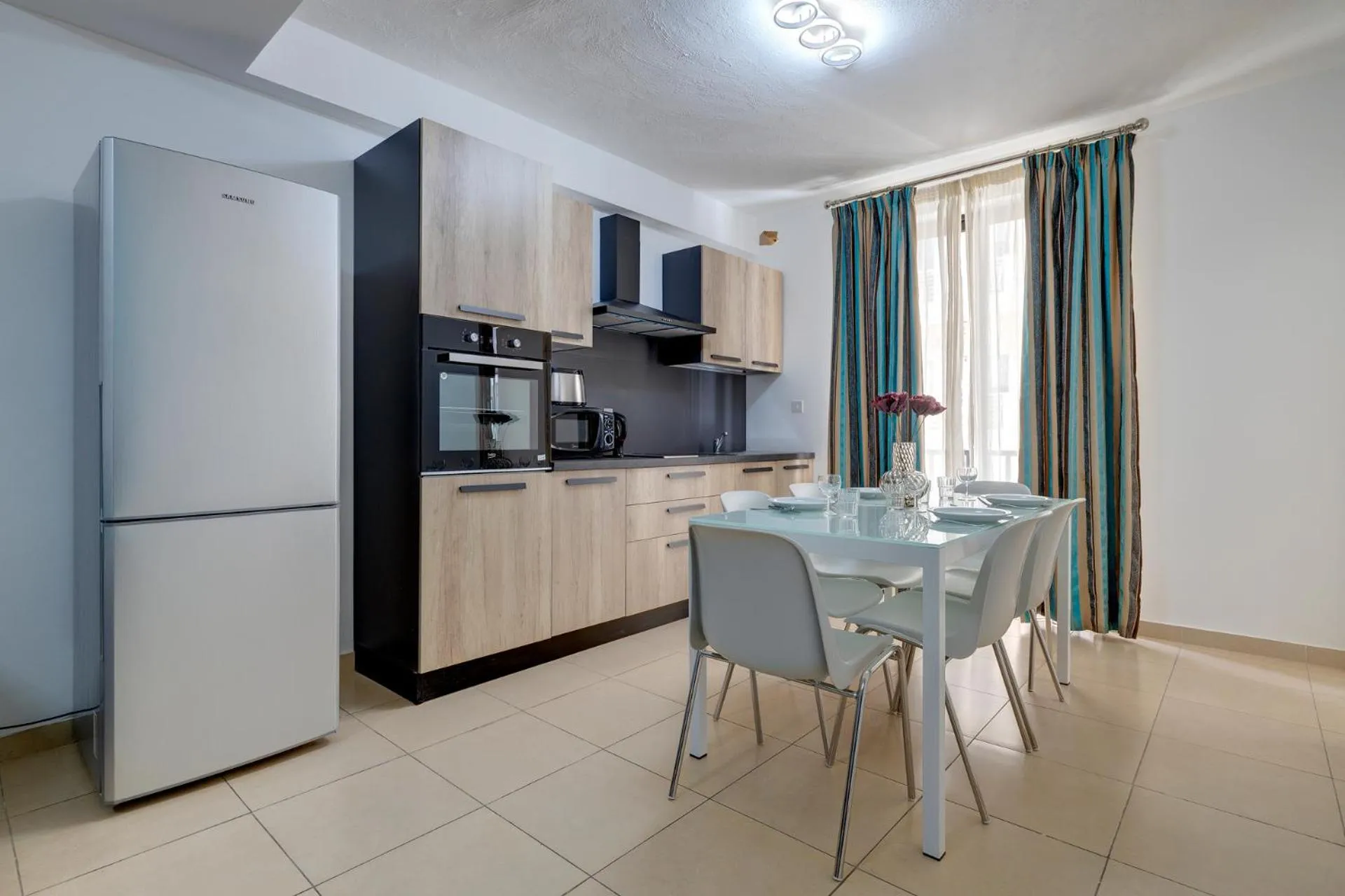 Kitchen or kitchenette in Sliema Tigne Suites