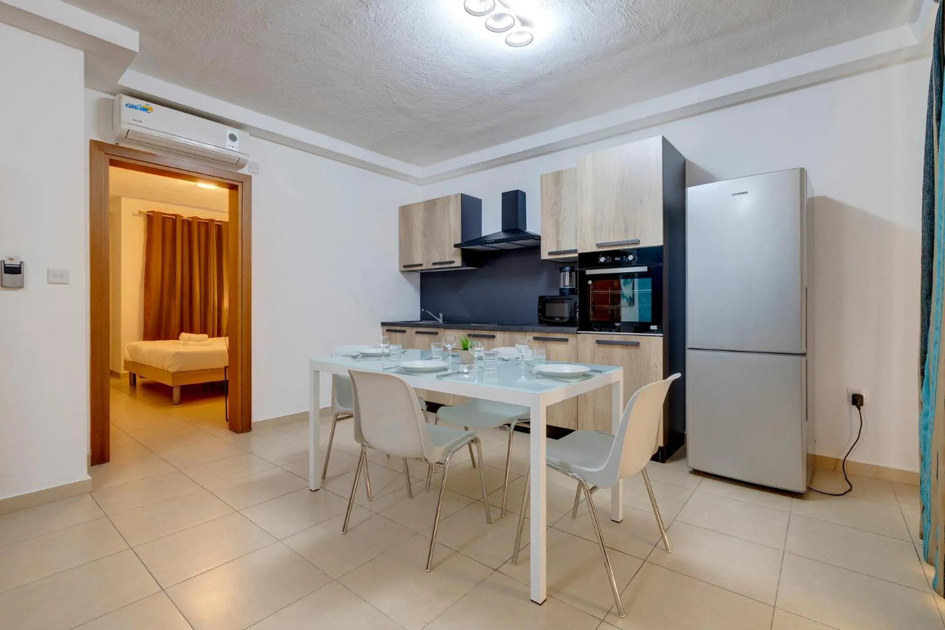 Kitchen or kitchenette in Sliema Tigne Suites