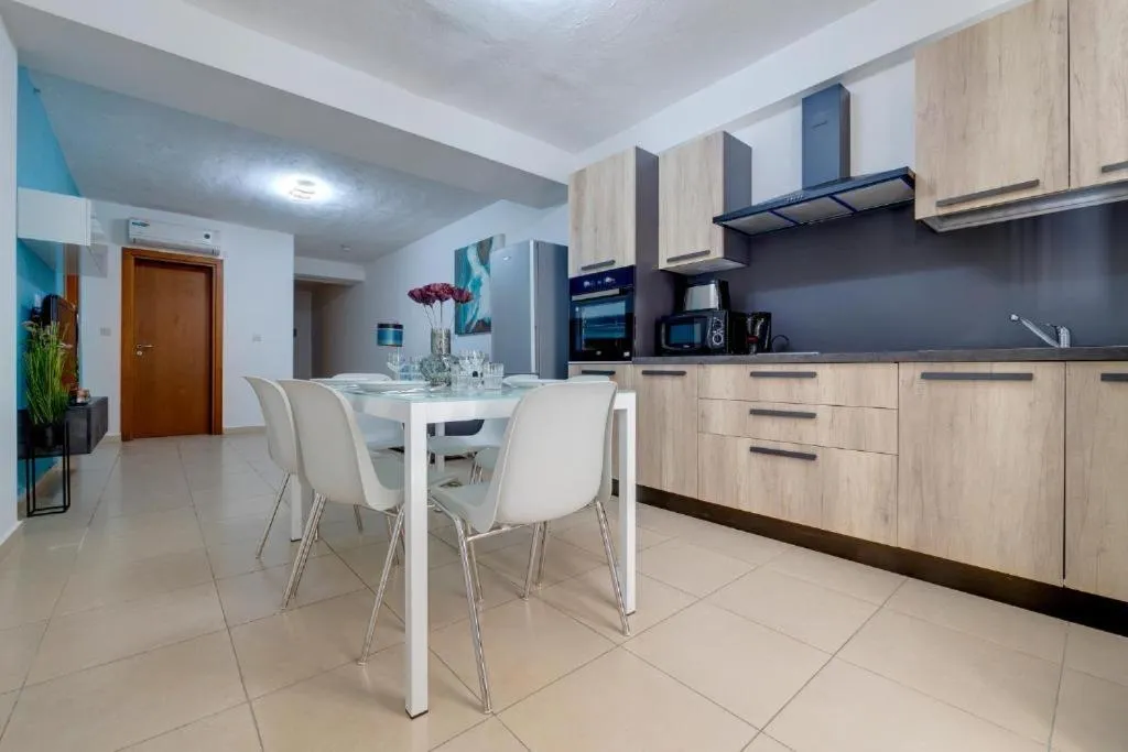Kitchen or kitchenette in Sliema Tigne Suites