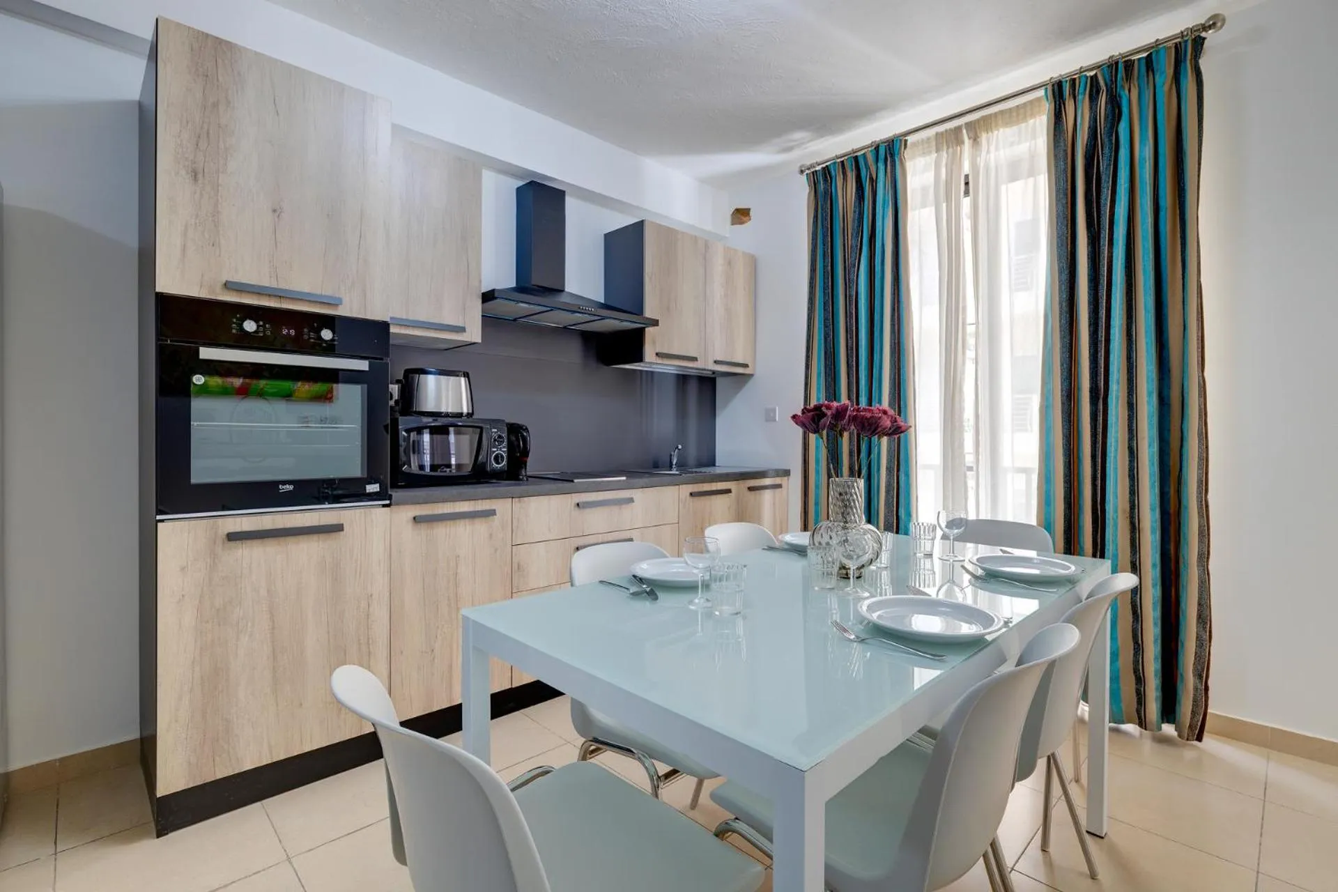 Kitchen or kitchenette in Sliema Tigne Suites