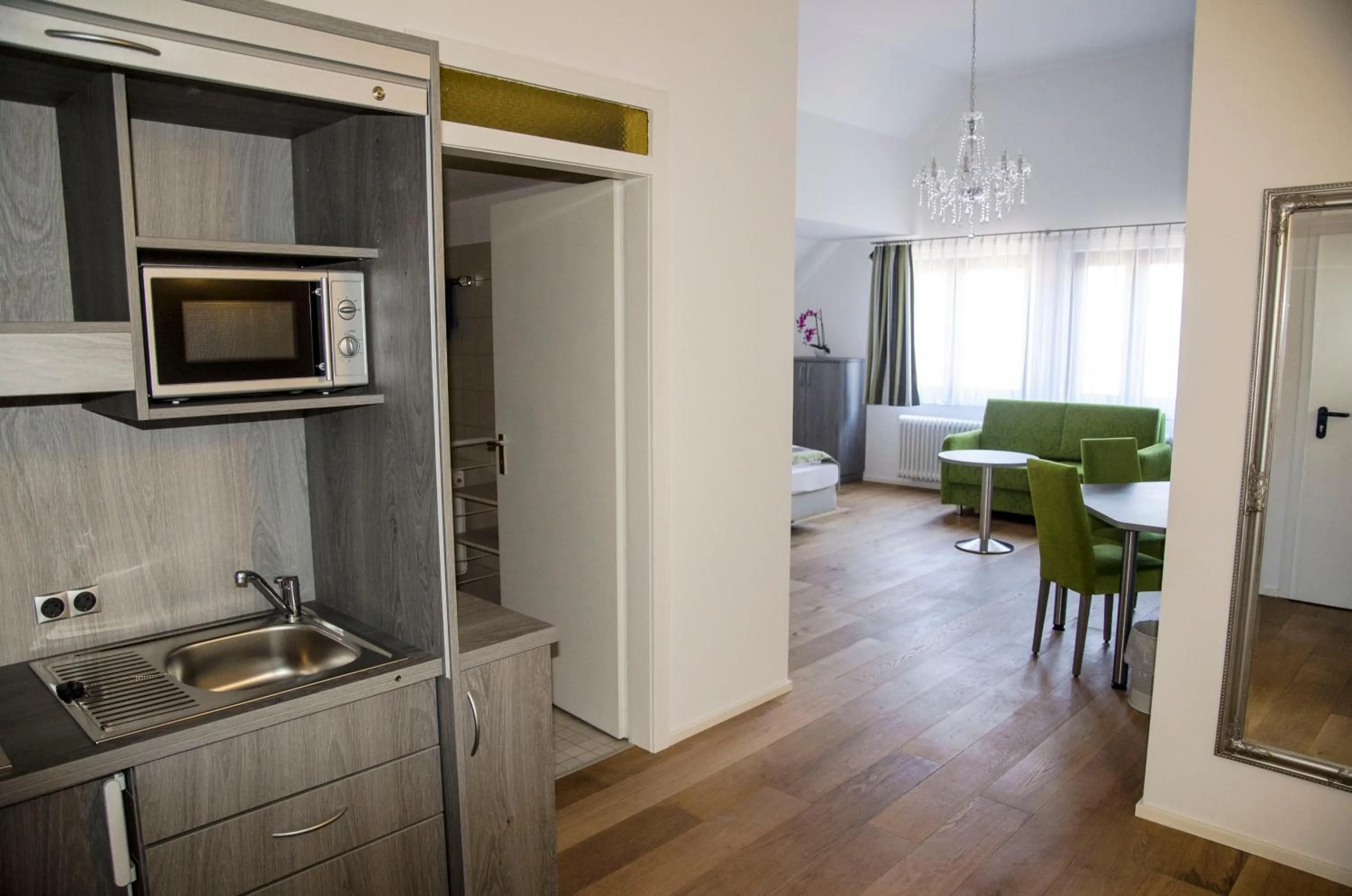 Kitchen or kitchenette in Hotel am Schloss