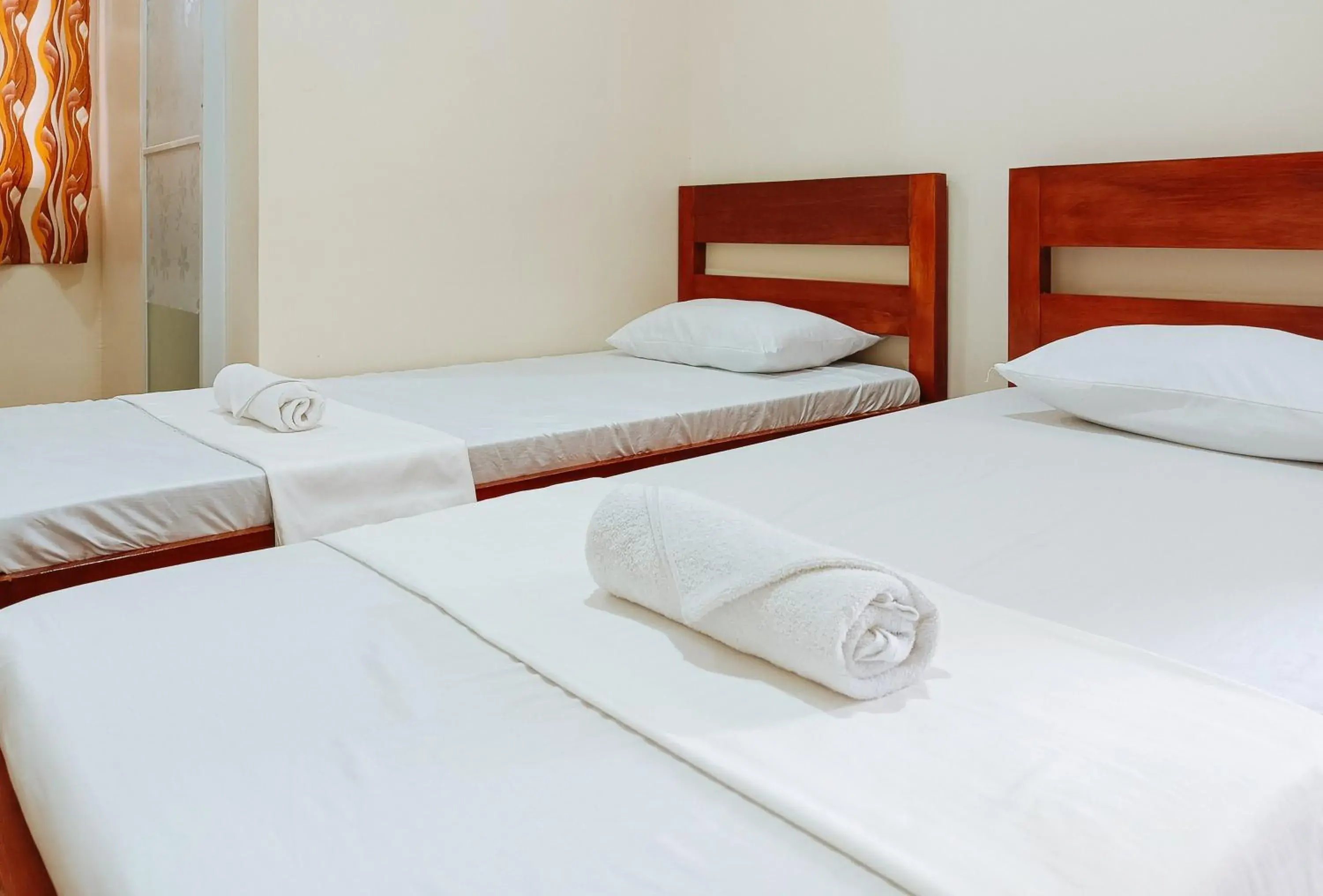 Twin Room in RedDoorz @ Star Jewel Lodge Apayao Twin Room in RedDoorz @ Star Jewel Lodge Apayao