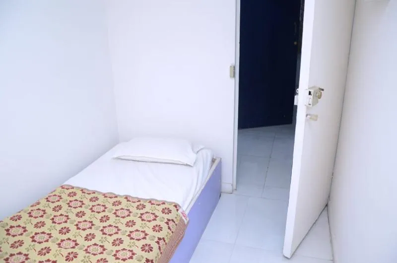 Bed in Hotel Sairam Lodge