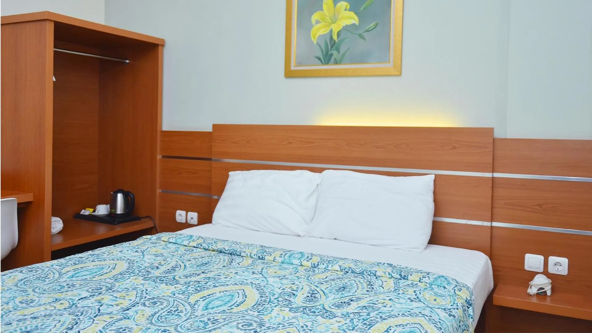 Bed in Gaia Asri Hotel
