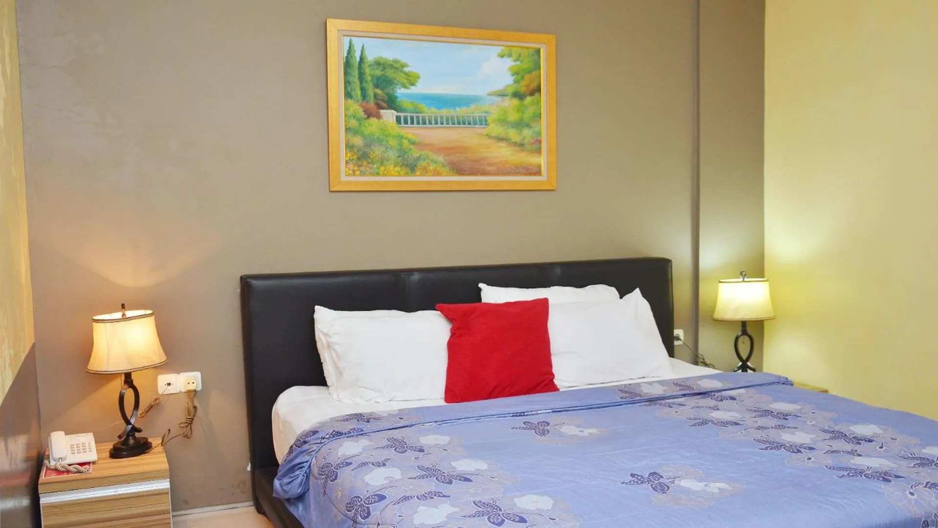 Bed in Gaia Asri Hotel