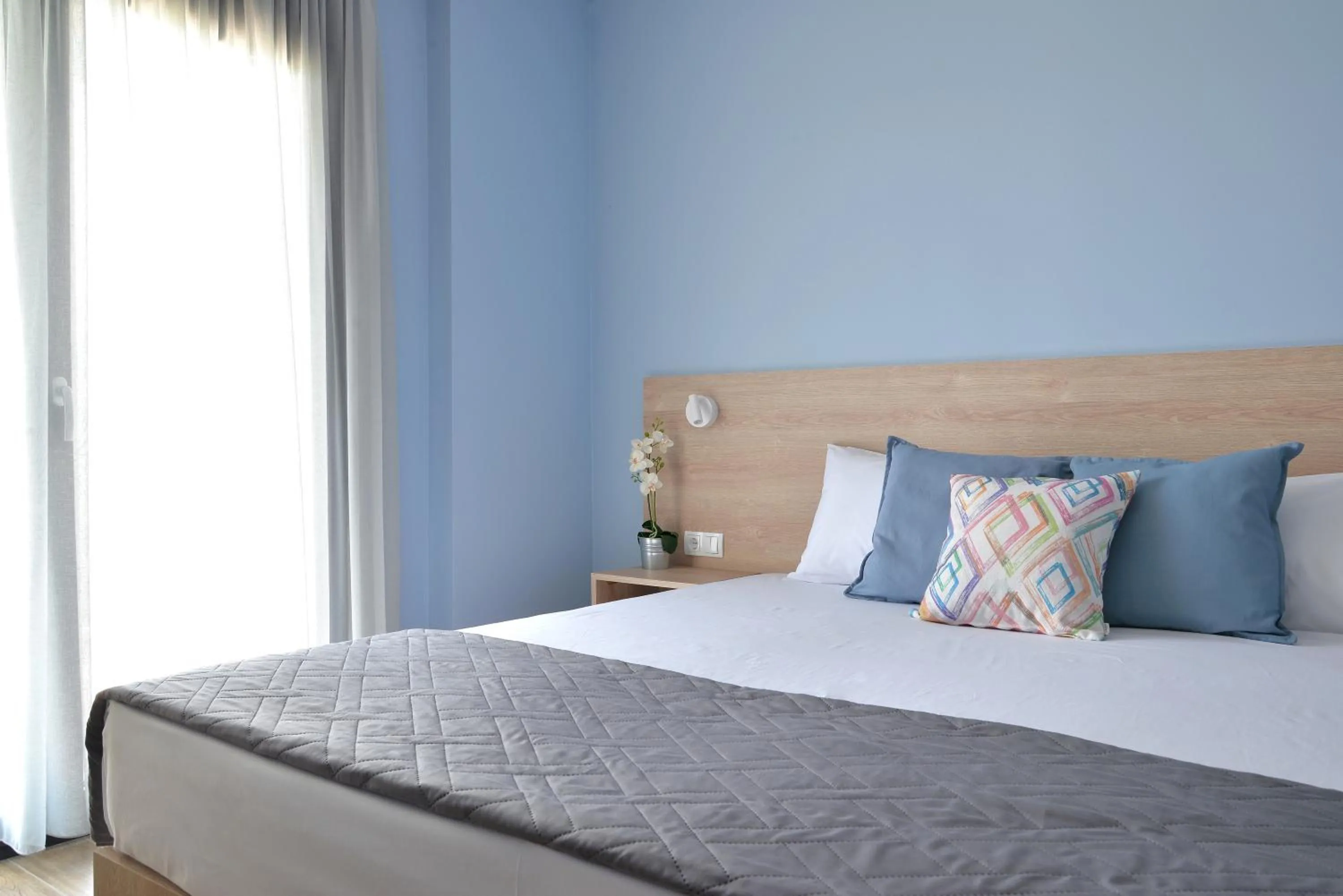 Bed in Niel Holiday Apartments, Panel Hospitality Homes & Villas