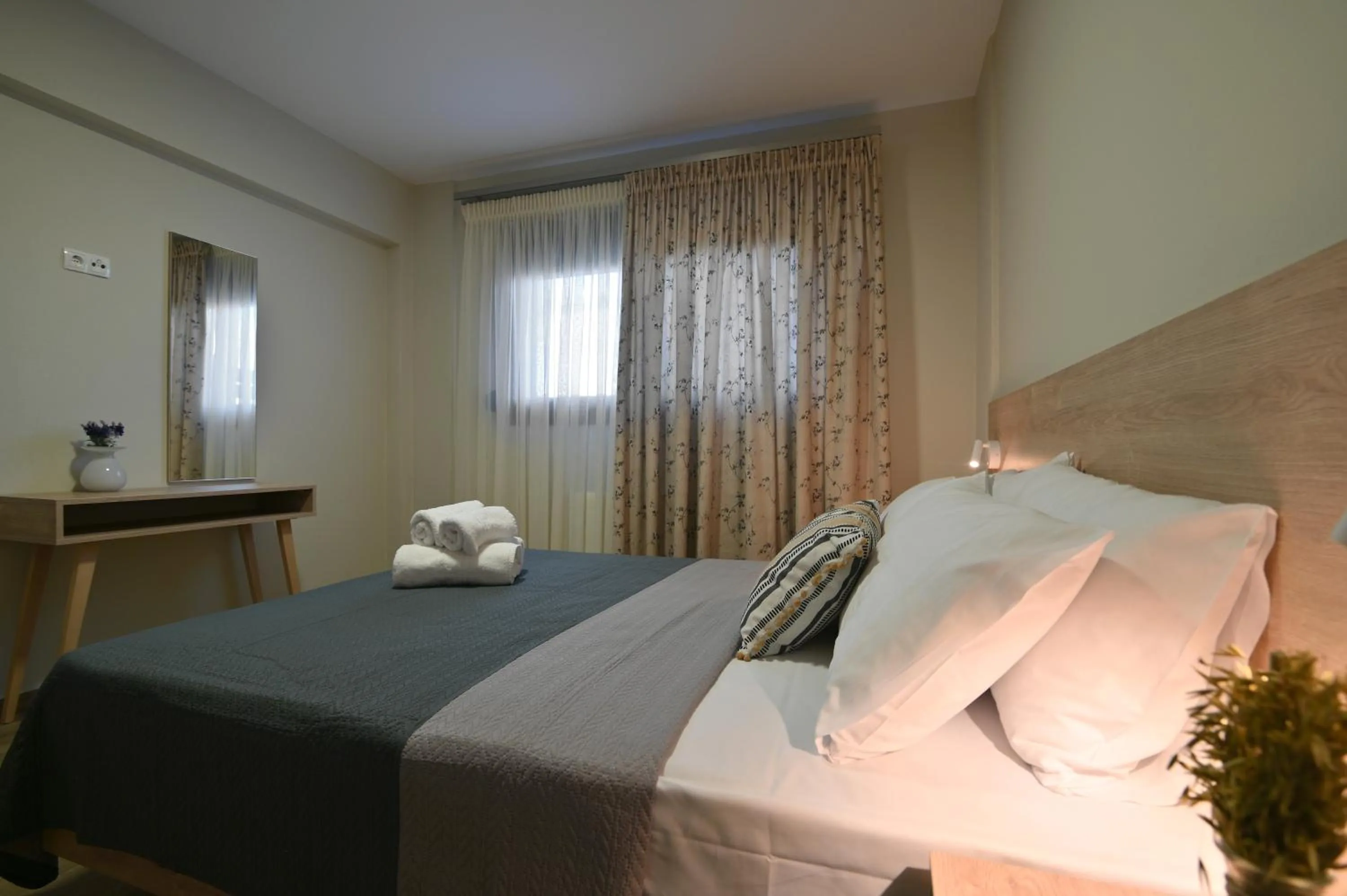 Bed in Niel Holiday Apartments, Panel Hospitality Homes & Villas