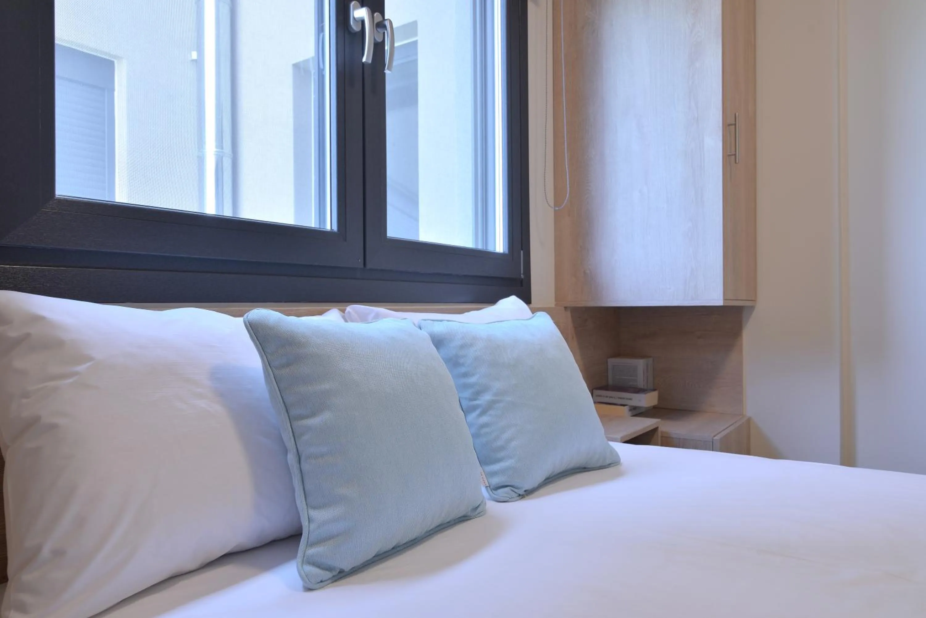 Bed in Niel Holiday Apartments, Panel Hospitality Homes & Villas